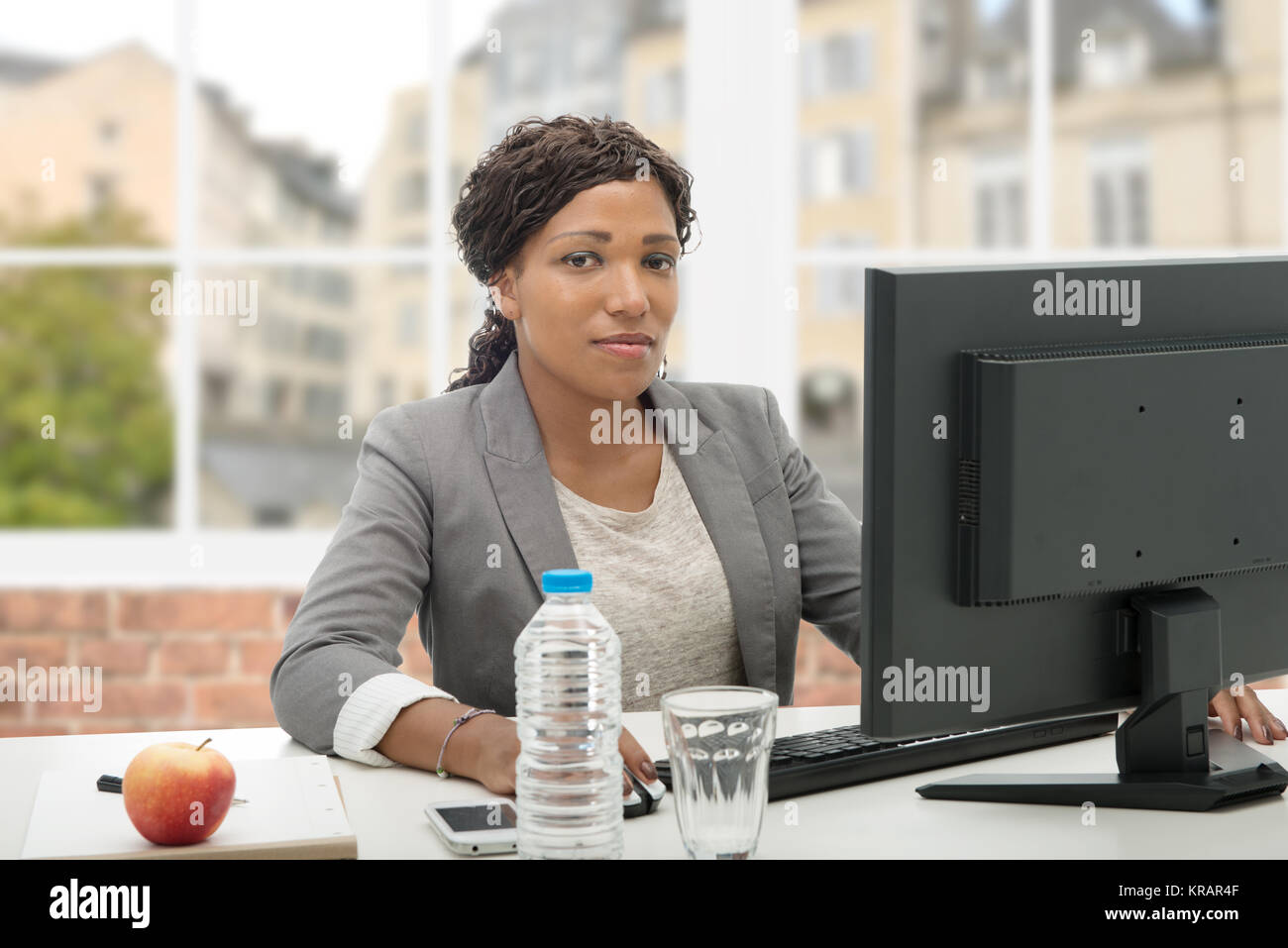 African American business woman working with computer Stock Photo - Alamy