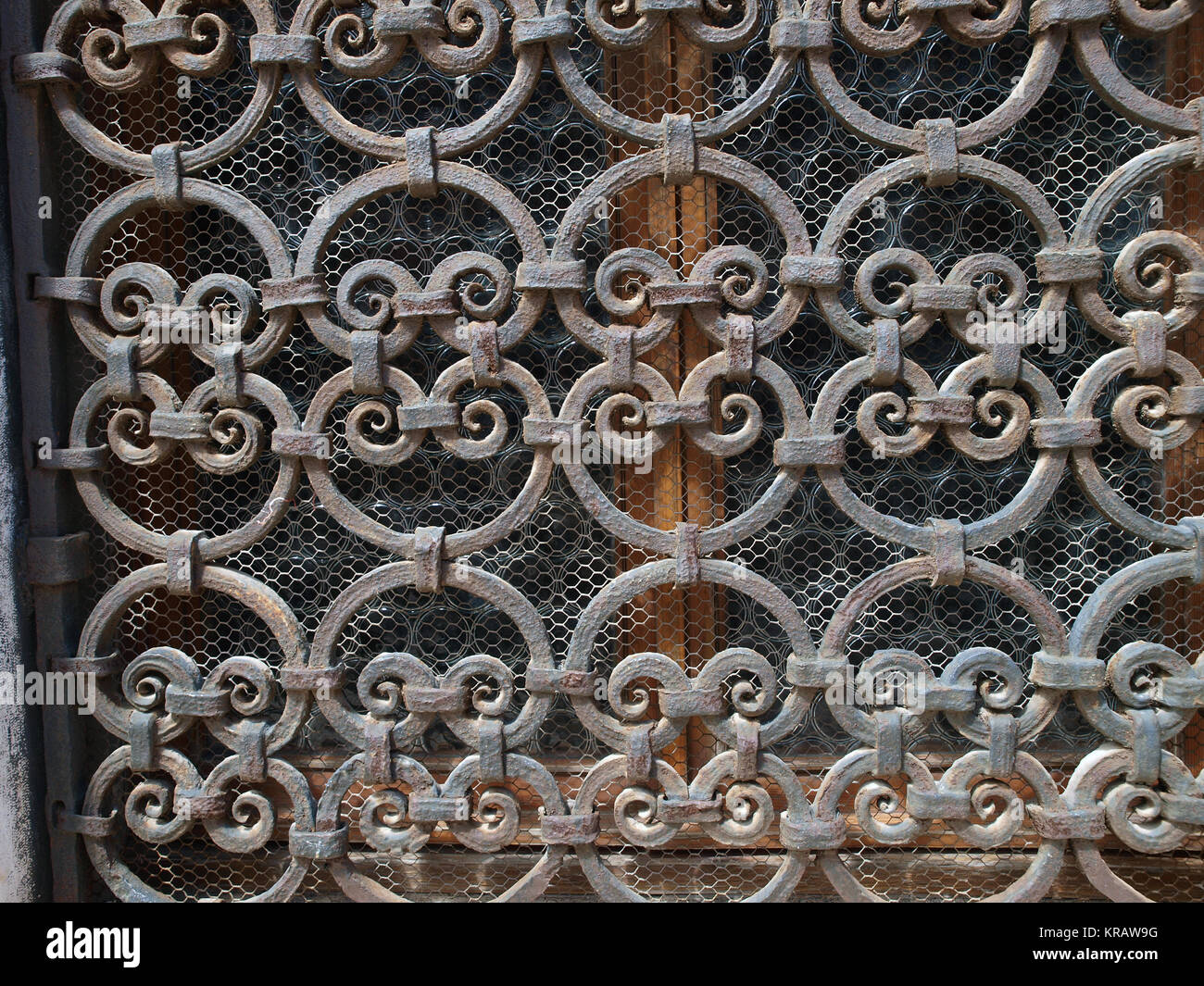Hand made solid iron grille in the window Stock Photo Alamy