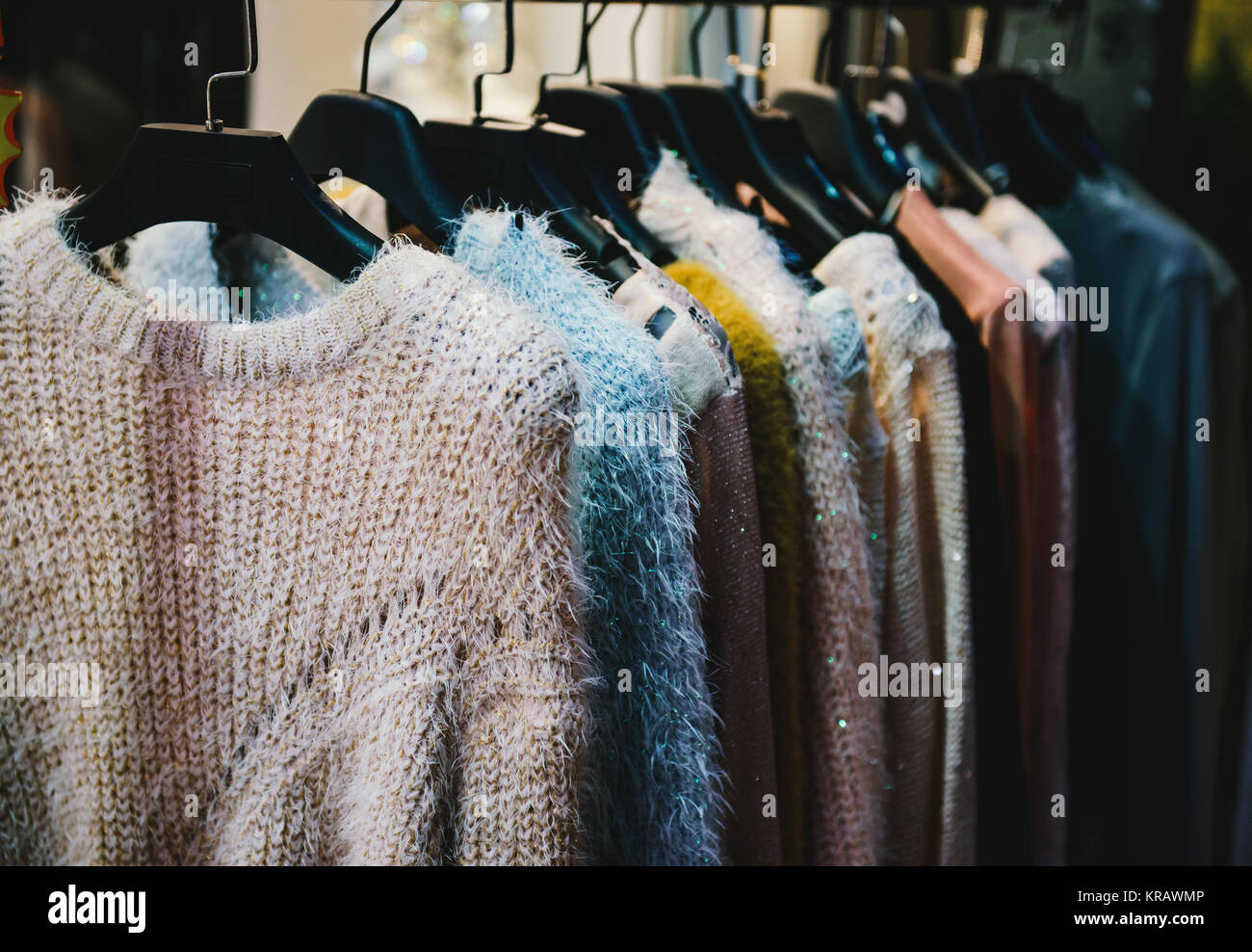 Girl clothes on hangers in a fashion store Stock Photo Alamy