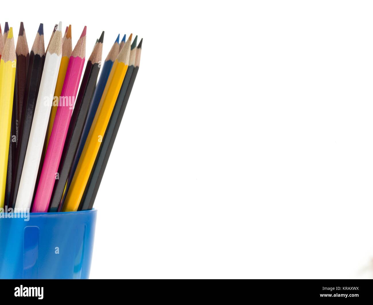 blue pencil holder and colorful pencils Stock Photo Alamy