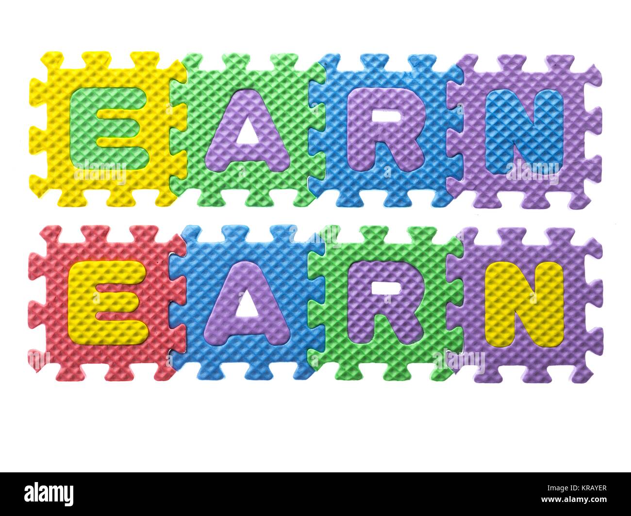 colorful puzzle forming word earn Stock Photo