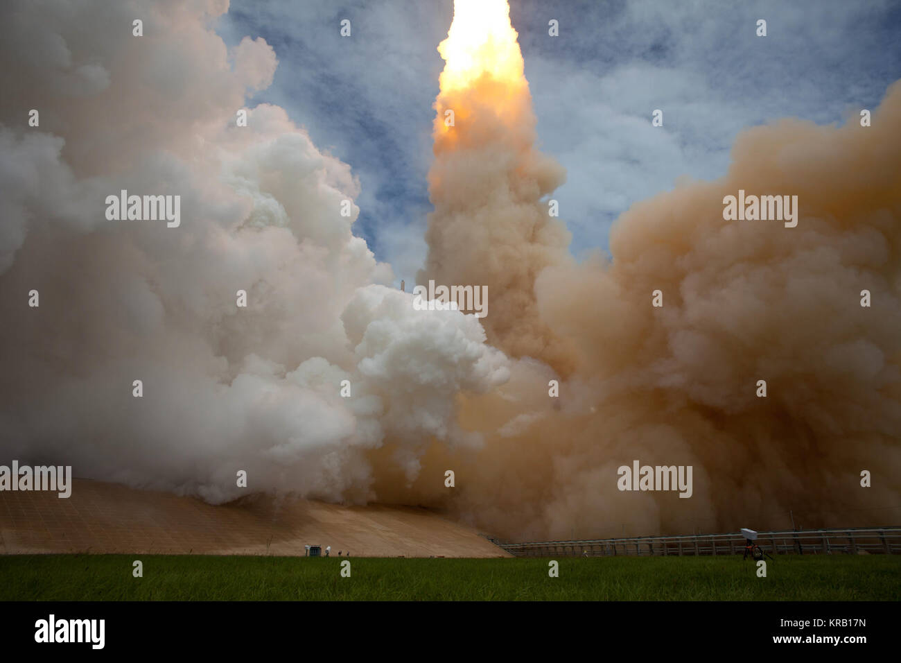 The exhaust plume from space shuttle Atlantis is seen as it launches from pad 39A on Friday, July 8, 2011, at NASA's Kennedy Space Center in Cape Canaveral, Fla. The launch of Atlantis, STS-135, is the final flight of the shuttle program, a 12-day mission to the International Space Station.  Photo Credit: (NASA/Bill Ingalls) Space Shuttle blasts away one last time Stock Photo