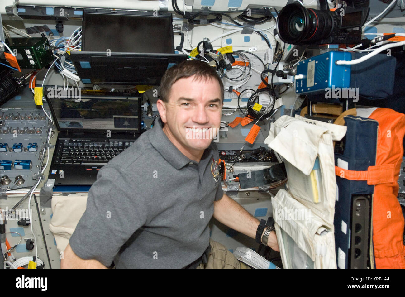 STS-135 Rex Walheim on the flight deck Stock Photo - Alamy