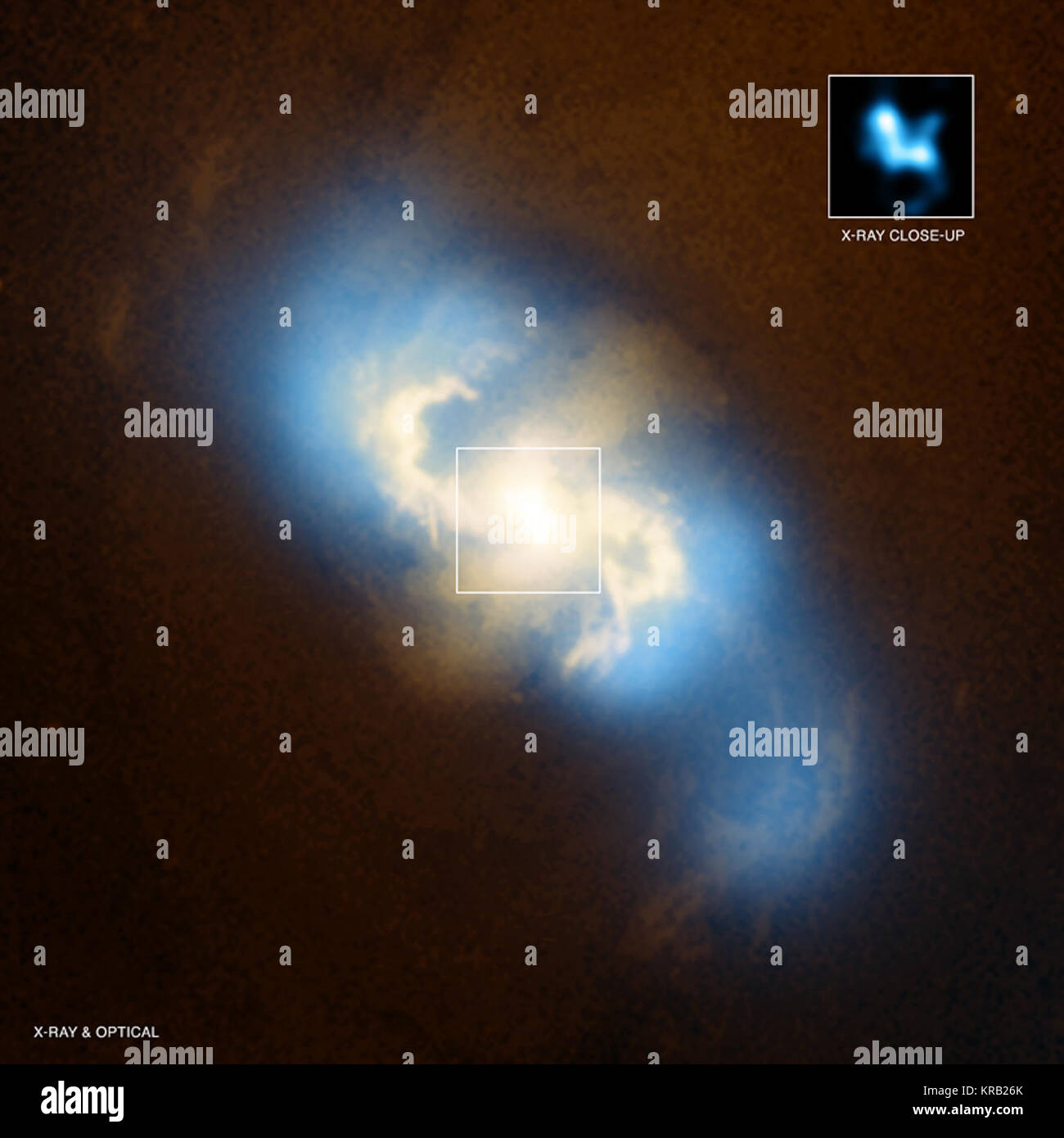 Evidence for a pair of supermassive black holes in a spiral   galaxy has been found in data from NASA's Chandra X-ray Observatory.    This main image is a composite of X-rays from Chandra (blue) and optical data from the Hubble Space Telescope (orange and yellow) of the spiral galaxy NGC 3393. Meanwhile, the inset box shows the central region of NGC 3993 as observed just by Chandra. Two separate peaks of X-ray emission (roughly at 11 o'clock and 4 o'clock) can clearly be seen in the inset box.  These two sources are black holes that are actively growing, generating X-ray emission as gas falls  Stock Photo