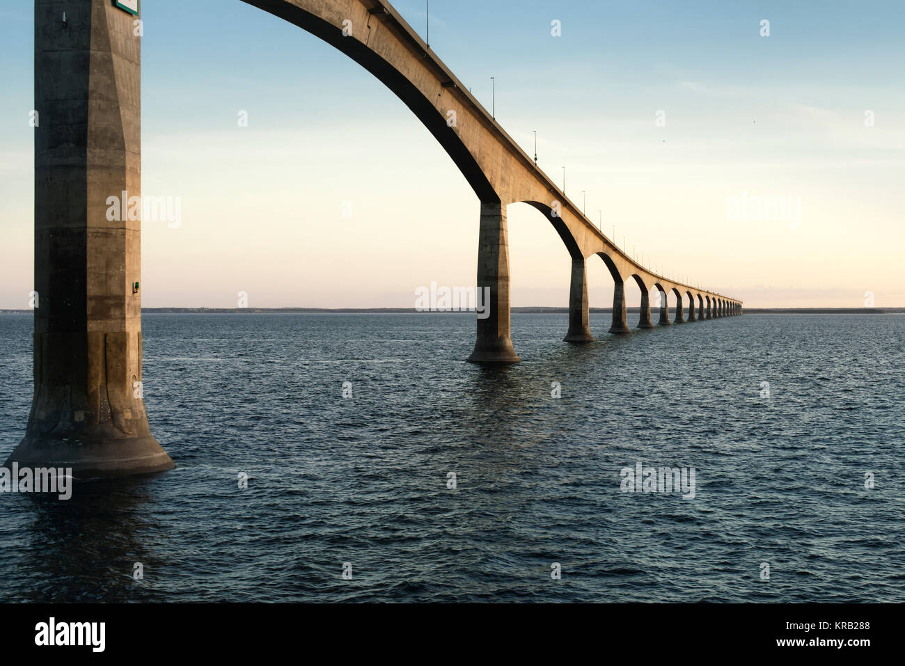 Confederation Bridge over sunset sky, Northumberland Strait, Prince Edward Island, Canada Stock Photo