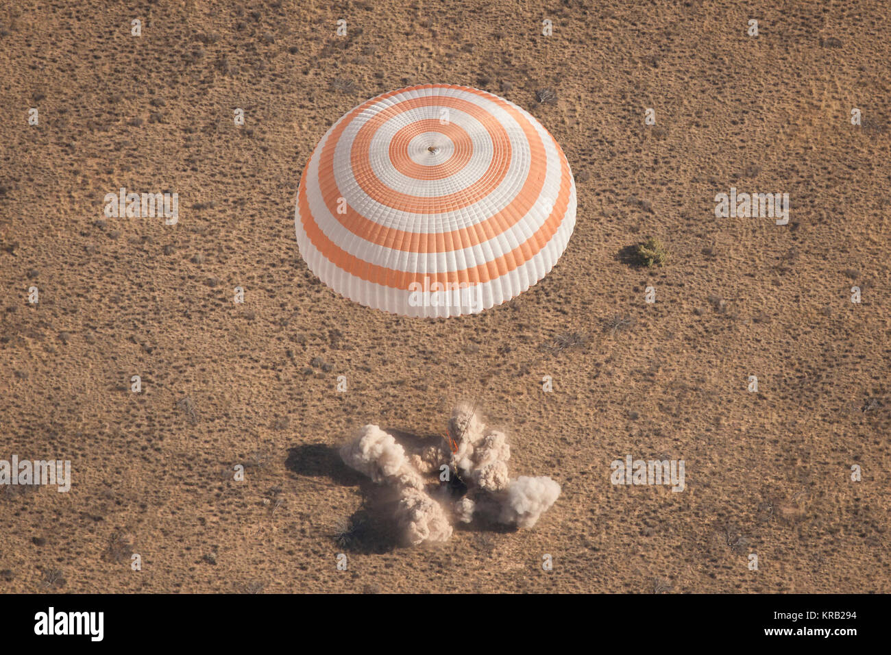 The Soyuz TMA-21 spacecraft is seen as it lands with Expedition 28 Commander Andrey Borisenko, and Flight Engineers Ron Garan, and Alexander Samokutyaev in a remote area outside of the town of Zhezkazgan, Kazakhstan, on Friday, Sept. 16, 2011. NASA Astronaut Garan, Russian Cosmonauts Borisenko and Samokutyaev are returning from more than five months onboard the International Space Station where they served as members of the Expedition 27 and 28 crews. Photo Credit: (NASA/Bill Ingalls) Soyuz TMA-21 landing Stock Photo