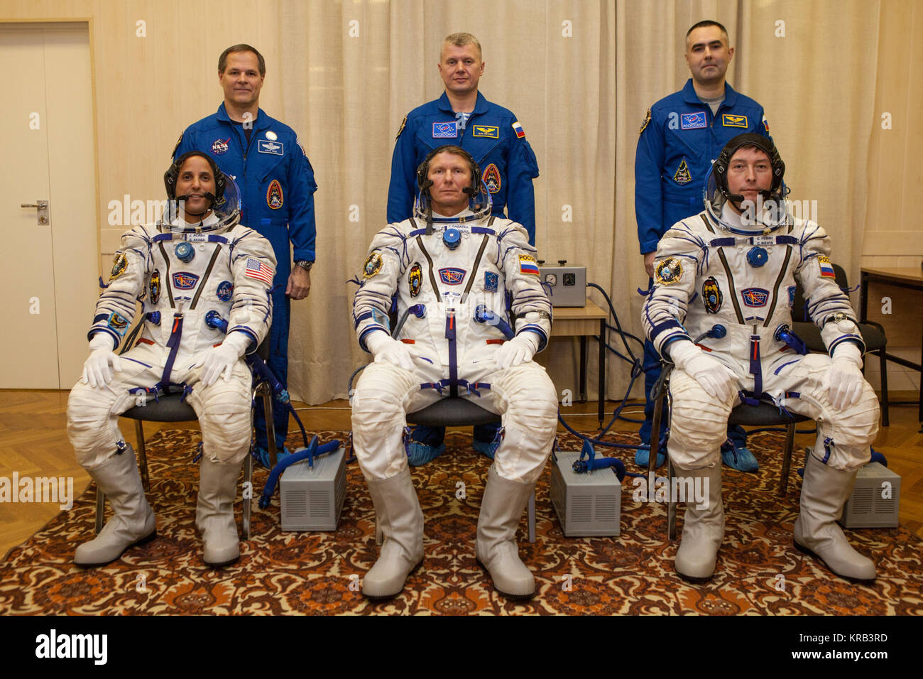 Expedition 31 Flight Engineer Joe Acaba, seated left, Soyuz Commander Gennady Padalka, and, Flight Engineer Sergei Revin, seated right, pose for a picture with their backup crew members Kevin Ford, standing left, Oleg Novitskiy and Evgeny Tarelkin, standing right, just a few hours before their launch onboard the Soyuz TMA-04M on Tuesday, May 15, 2012 at the Baikonur Cosmodrome in Kazakhstan. The Soyuz spacecraft with Padalka, Revin, and Acaba onboard, launched at 9:01 a.m. Kazakhstan time on Tuesday, May 15.  Photo Credit: (NASA/GCTC/Andrey Shelepin) Soyuz TMA-04M crew with backup crew Stock Photo