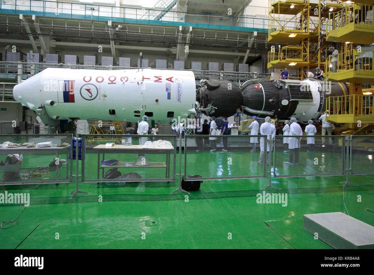 At the Baikonur Cosmodrome in Kazakhstan, the Soyuz TMA-05M spacecraft (right) is readied for its encapsulation into the upper stage of its Soyuz booster (left) July 8, 2012 in advance of its rollout to the launch pad July 12 and the launch of its occupants, Expedition 32/33 Soyuz Commander Yuri Malenchenko, NASA Flight Engineer Sunita Williams and Flight Engineer Aki Hoshide of the Japan Aerospace Exploration Agency July 15 for a four-month mission on the International Space Station.  NASA/Victor Zelentsov Soyuz TMA-05M spacecraft integration facility 3 Stock Photo