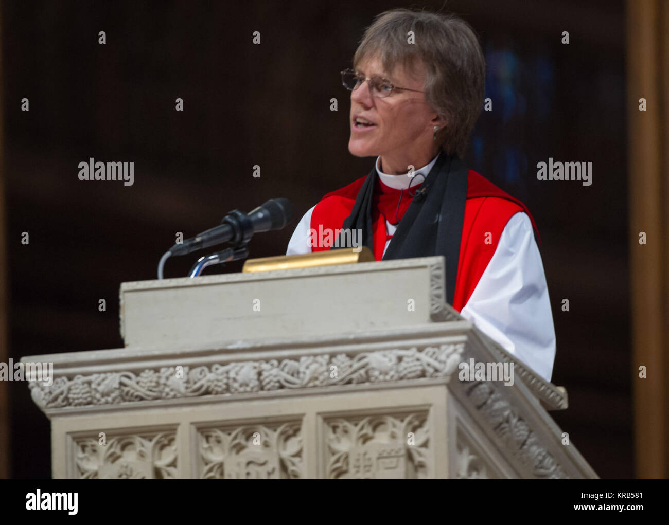 The Right Rev. Mariann Edgar Budde, bishop of Washington, delivers the Homily during a memorial service celebrating the life of Neil Armstrong at the Washington National Cathedral, Thursday, Sept. 13, 2012. Armstrong, the first man to walk on the moon during the 1969 Apollo 11 mission, died Saturday, Aug. 25. He was 82. Photo Credit:(NASA/Paul E. Alers) Neil Armstrong public memorial service (201209130017HQ) Stock Photo