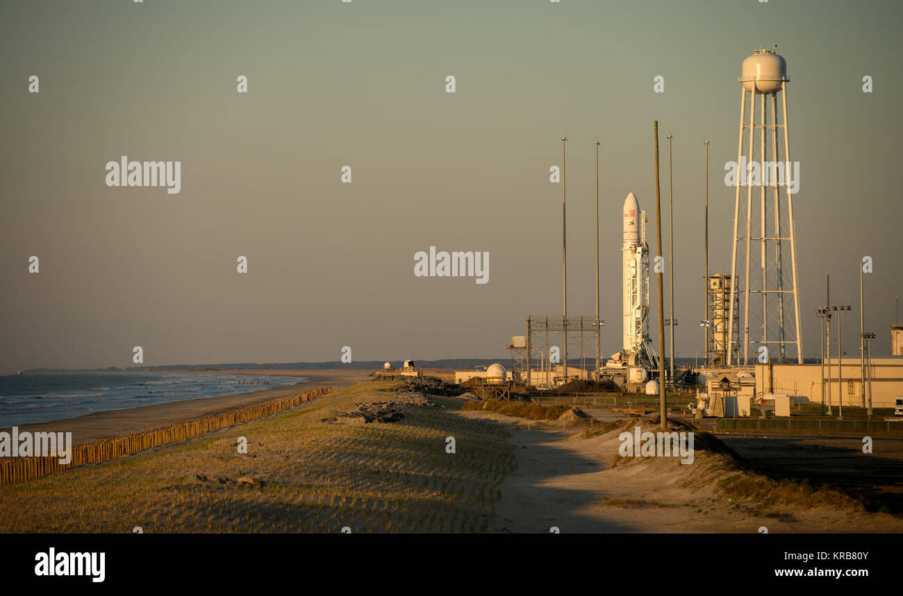 The Orbital Sciences Corporation Antares rocket is seen during sunrise on the Mid-Atlantic Regional Spaceport (MARS) Pad-0A at the NASA Wallops Flight Facility in Virginia, Sunday, April 21, 2013.  NASA's commercial space partner, Orbital Sciences Corporation, is scheduled to test launch its first Antares later in the day.  Photo Credit: (NASA/Bill Ingalls) Antares Rocket Preparation (201304210003HQ) Stock Photo