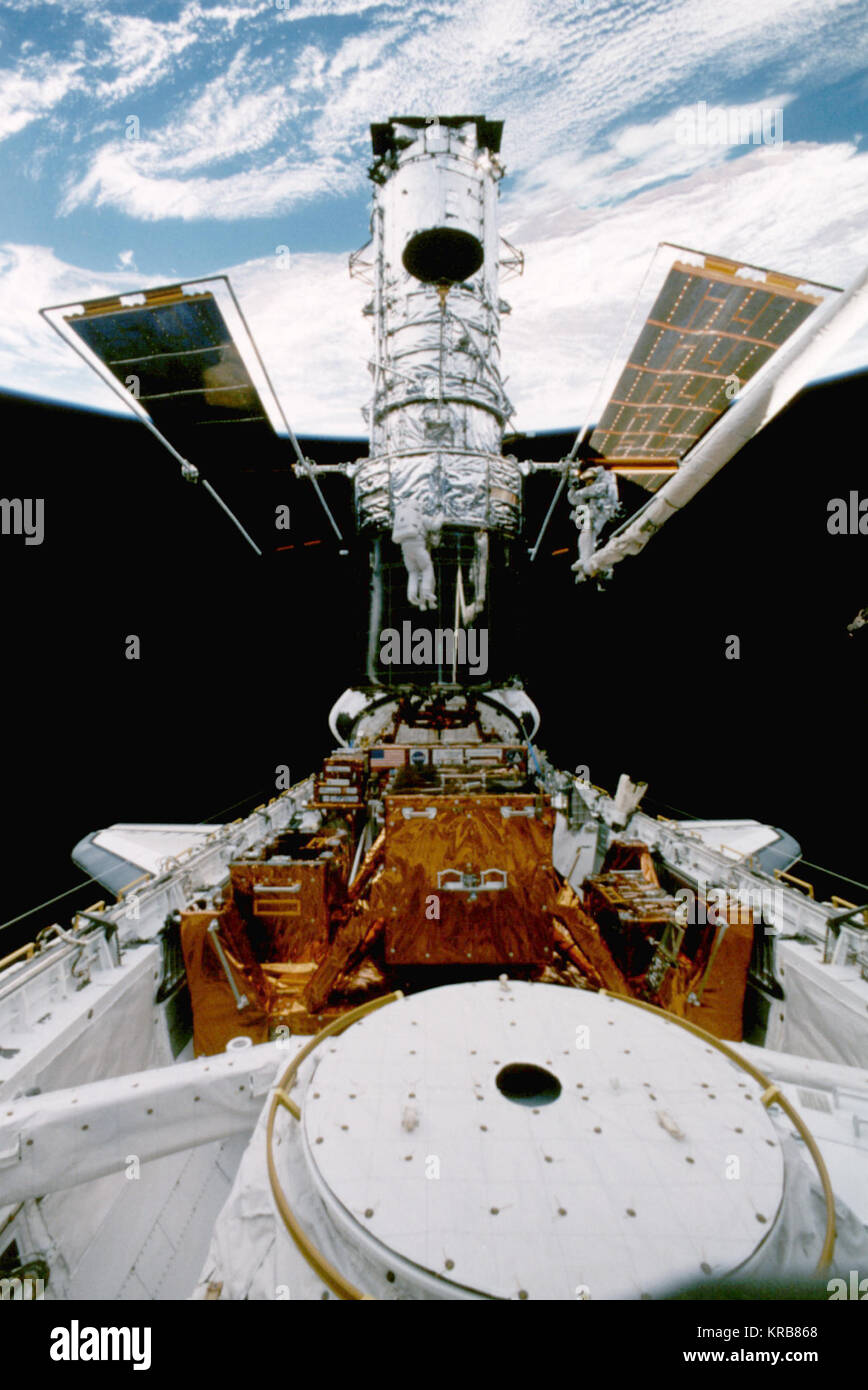 Hubble Space Telescope being serviced in Discovery's payload bay Hubble