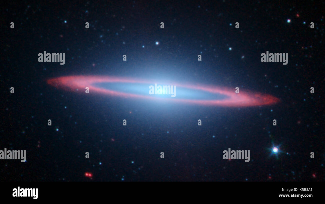 NASA's Spitzer Space Telescopes created this striking infrared image of one of the most popular sights in the universe. Messier 104 is commonly known as the Sombrero galaxy because in visible light, it resembles the broad-brimmed Mexican hat. However, in Spitzer's striking infrared view, the galaxy looks more like a 'bull's eye.'  In visible light images, only the near rim of dust can be clearly seen in silhouette. Recent observations using Spitzer's infrared array camera uncovered the bright, smooth ring of dust circling the galaxy, seen in red. Spitzer's infrared view of the starlight, pierc Stock Photo