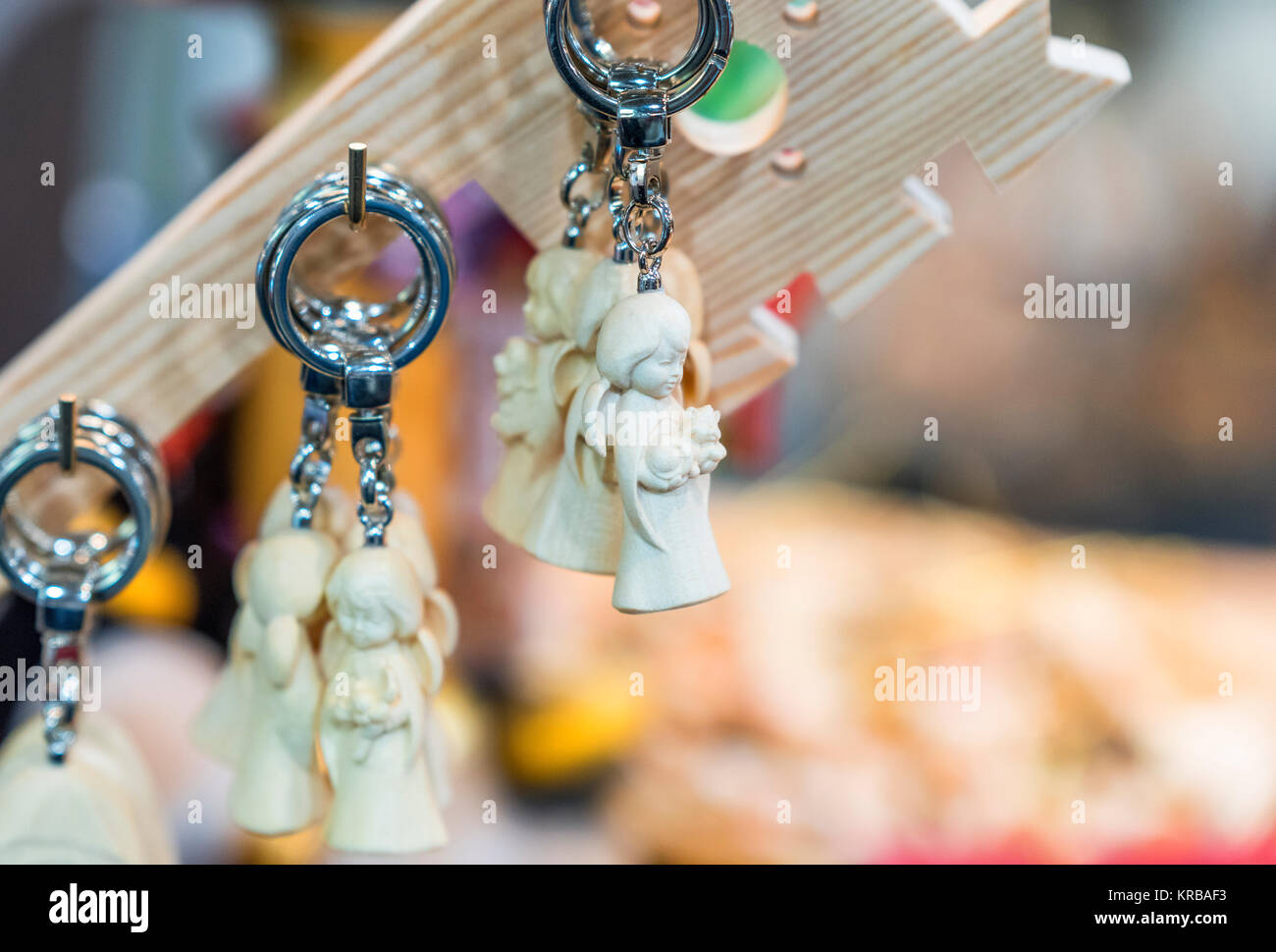 Hand made souvenirs on sale. Angel keyholder Stock Photo Alamy