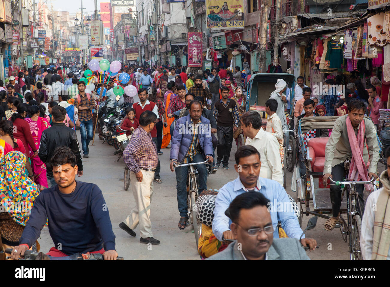 Traffic and pedestrians in a busy and congested Dasashwamedha Ghat Road in Varanasi, Uttar Pradesh, India Stock Photo