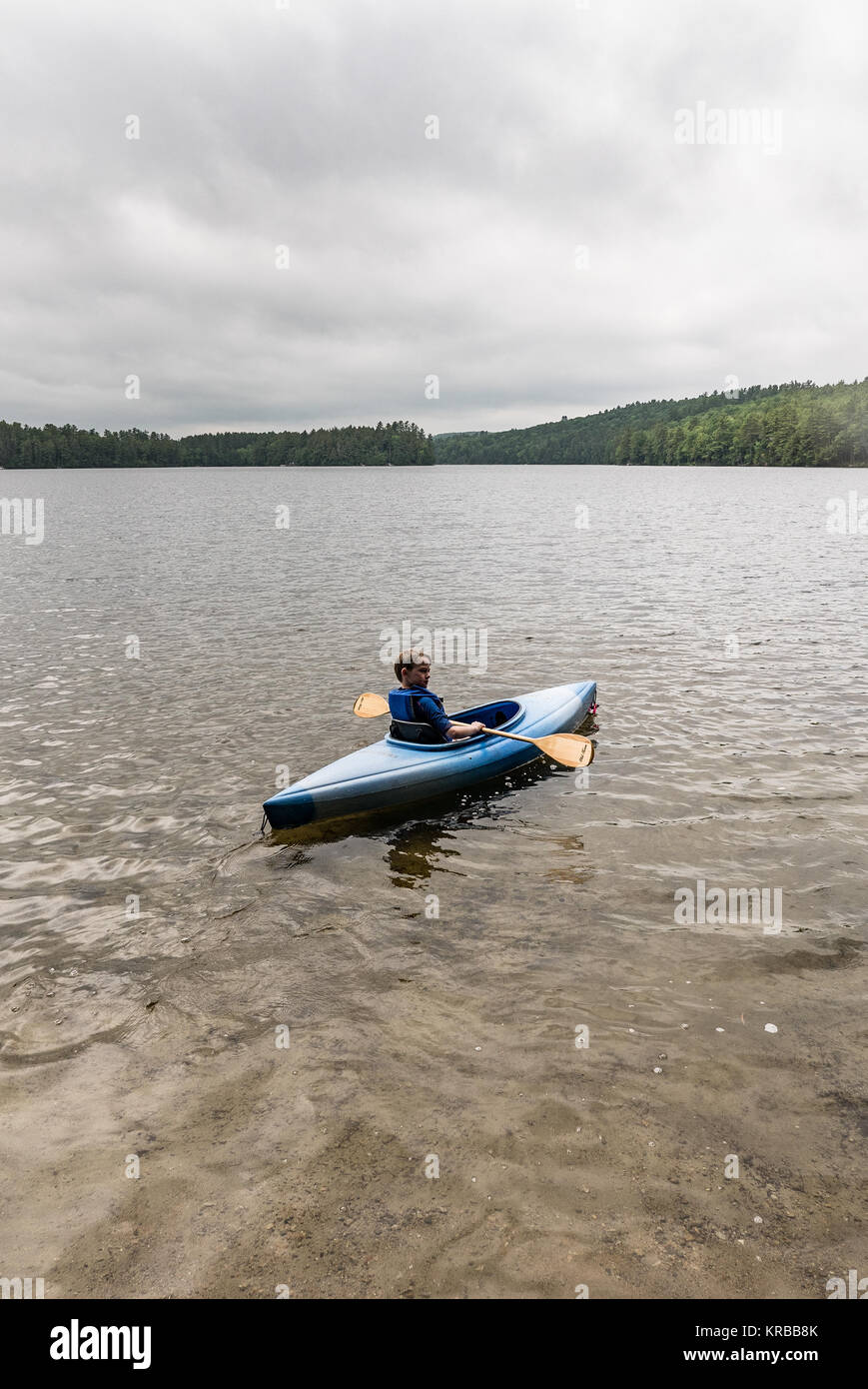 family kayaking on Flying Pond, Mount Vernon, Maine Stock Photo Alamy