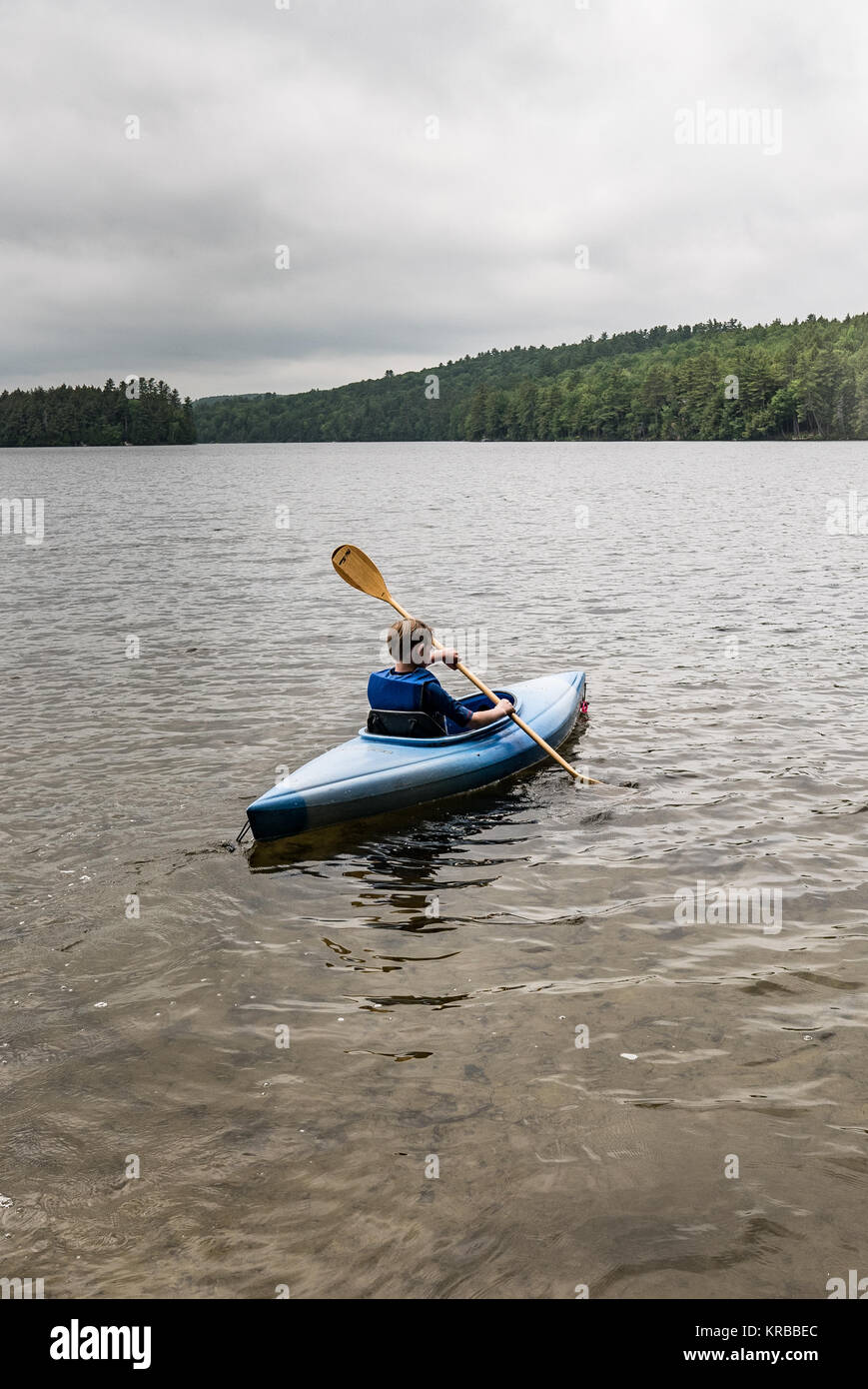 family kayaking on Flying Pond, Mount Vernon, Maine Stock Photo Alamy