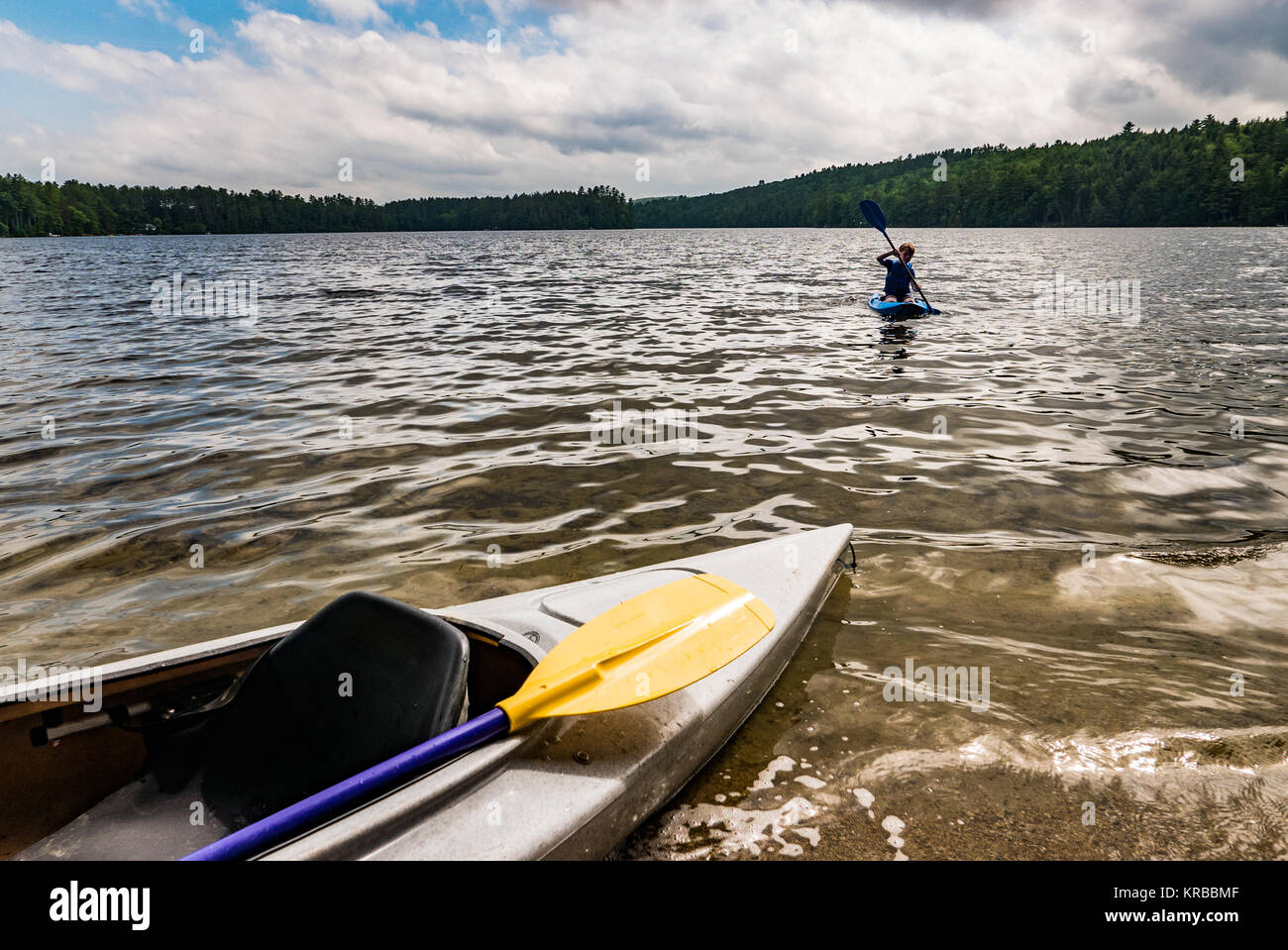 family kayaking on Flying Pond, Mount Vernon, Maine Stock Photo Alamy