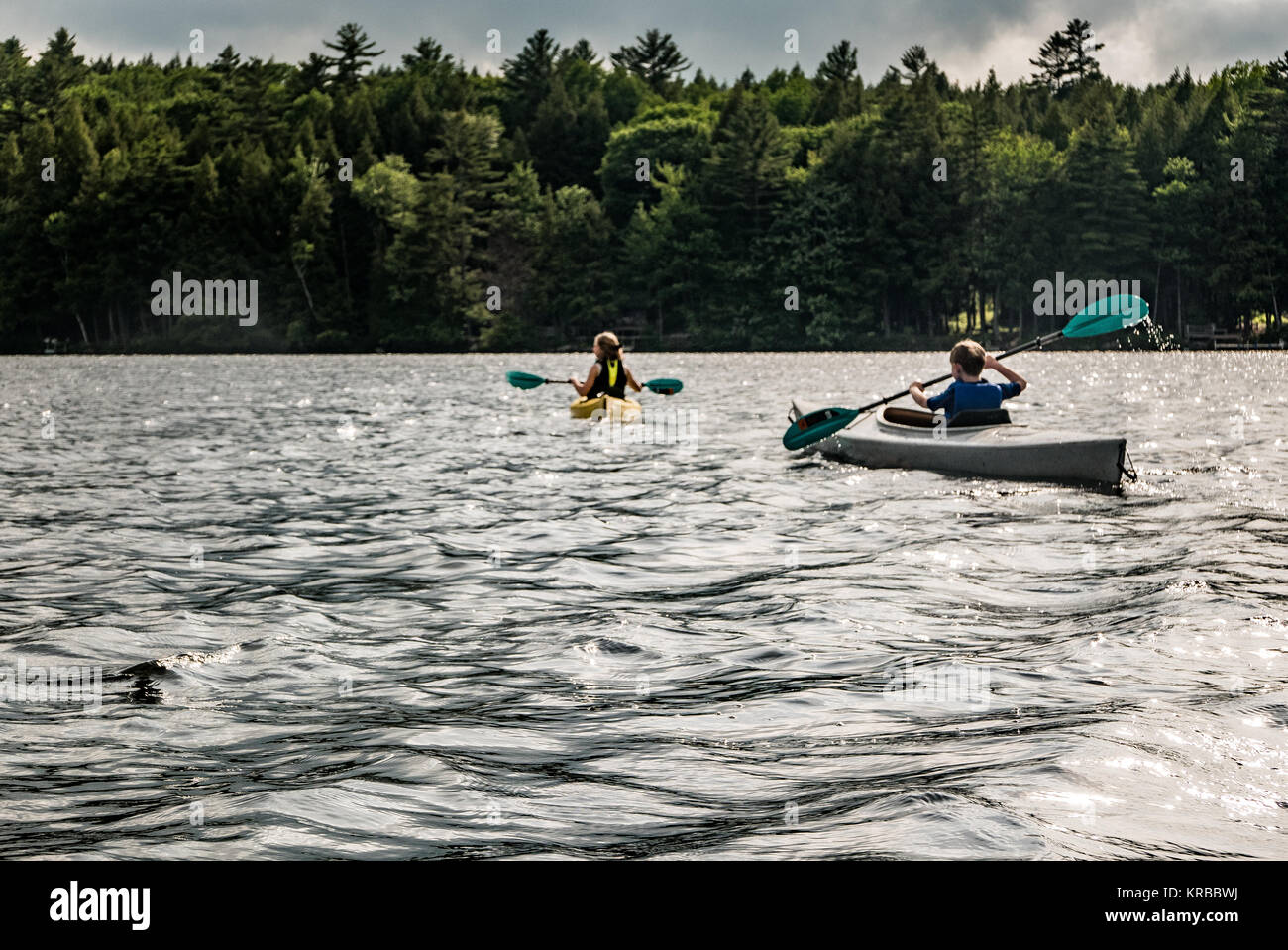 family kayaking on Flying Pond, Mount Vernon, Maine Stock Photo Alamy