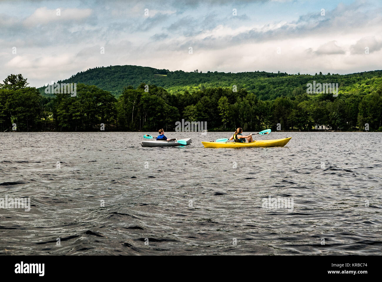 family kayaking on Flying Pond, Mount Vernon, Maine Stock Photo Alamy