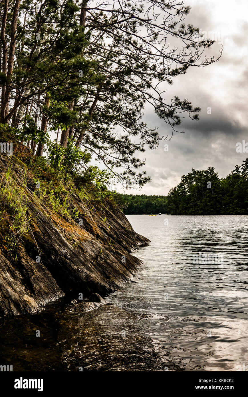 family kayaking on Flying Pond, Mount Vernon, Maine Stock Photo