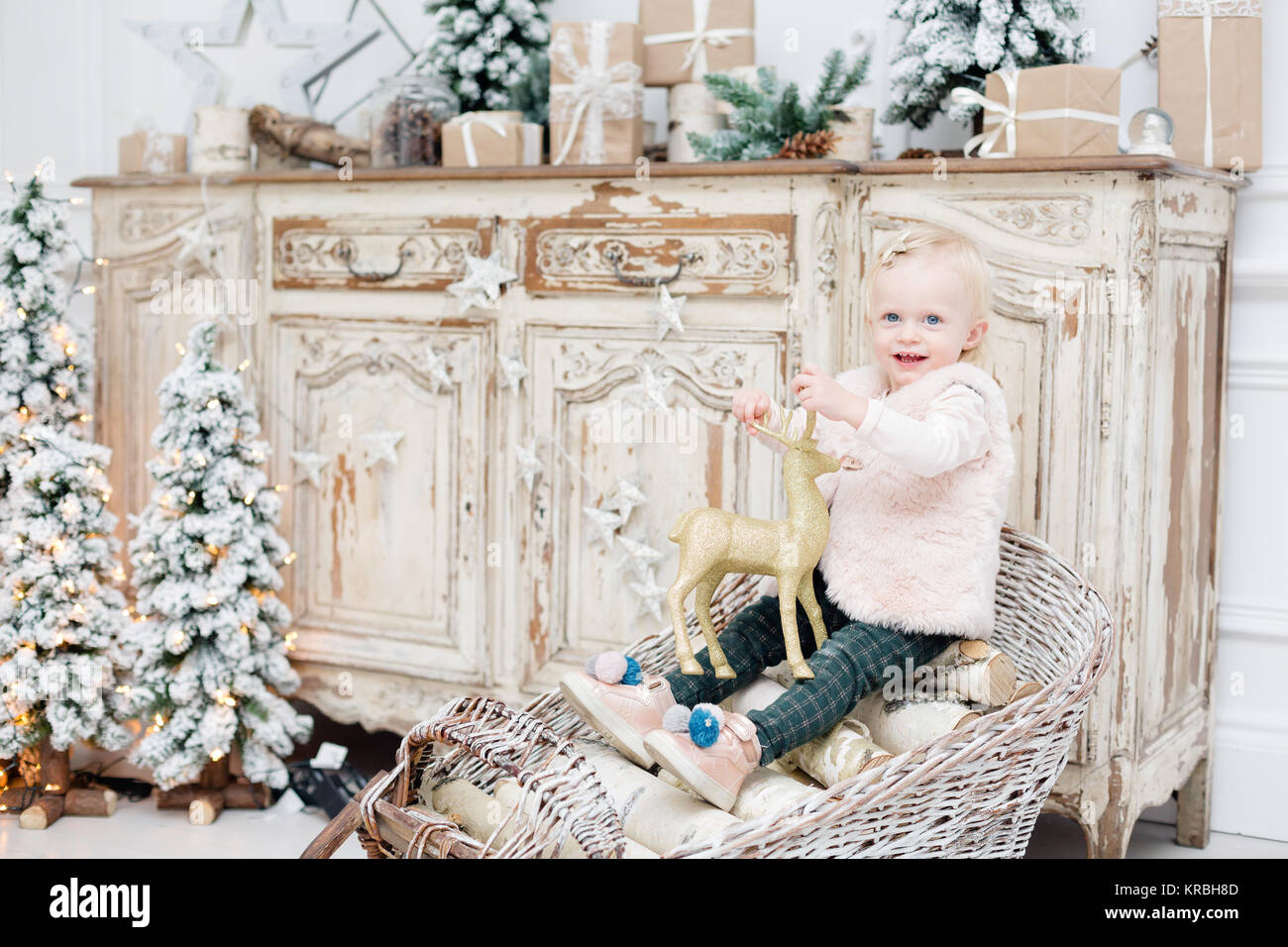 Portrait Beautiful Little Girl Near Old Vintage Chest Of Drawers