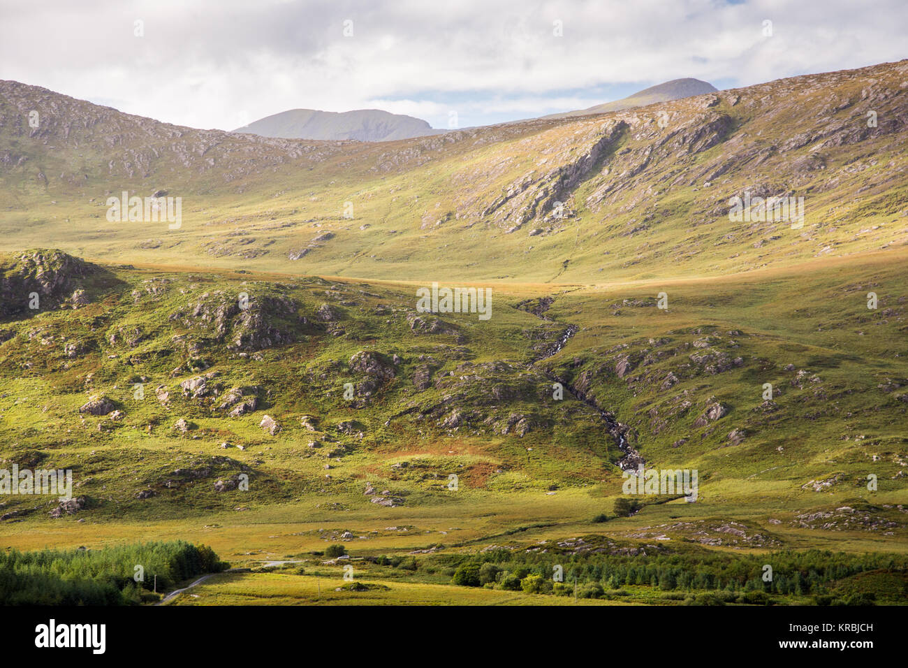 The mountains of the Macgillycuddy's Reeks rise above the Black Valley ...