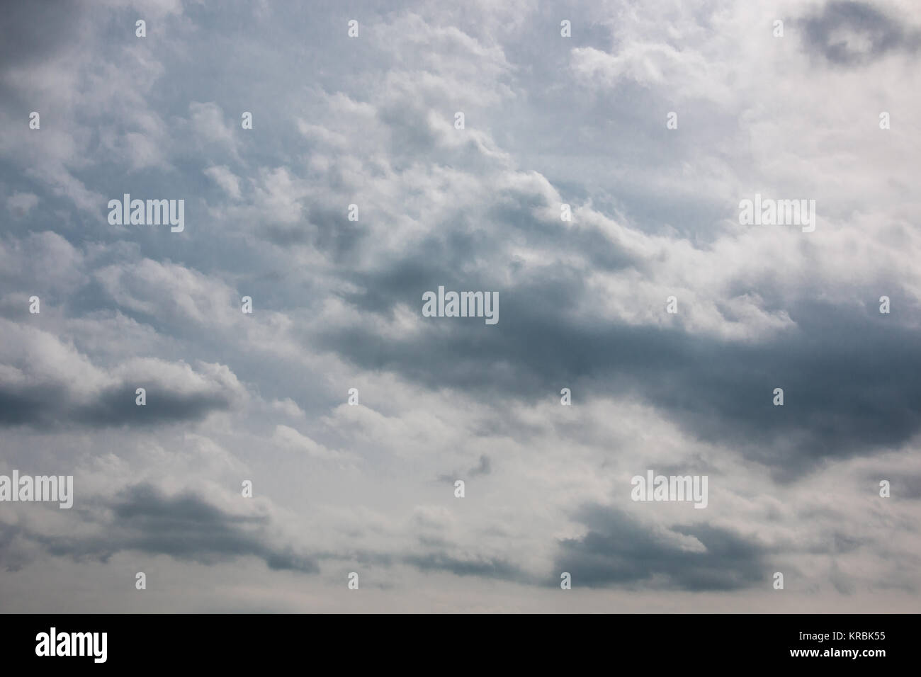 Dramatic blue sky and white and gray clouds Stock Photo - Alamy