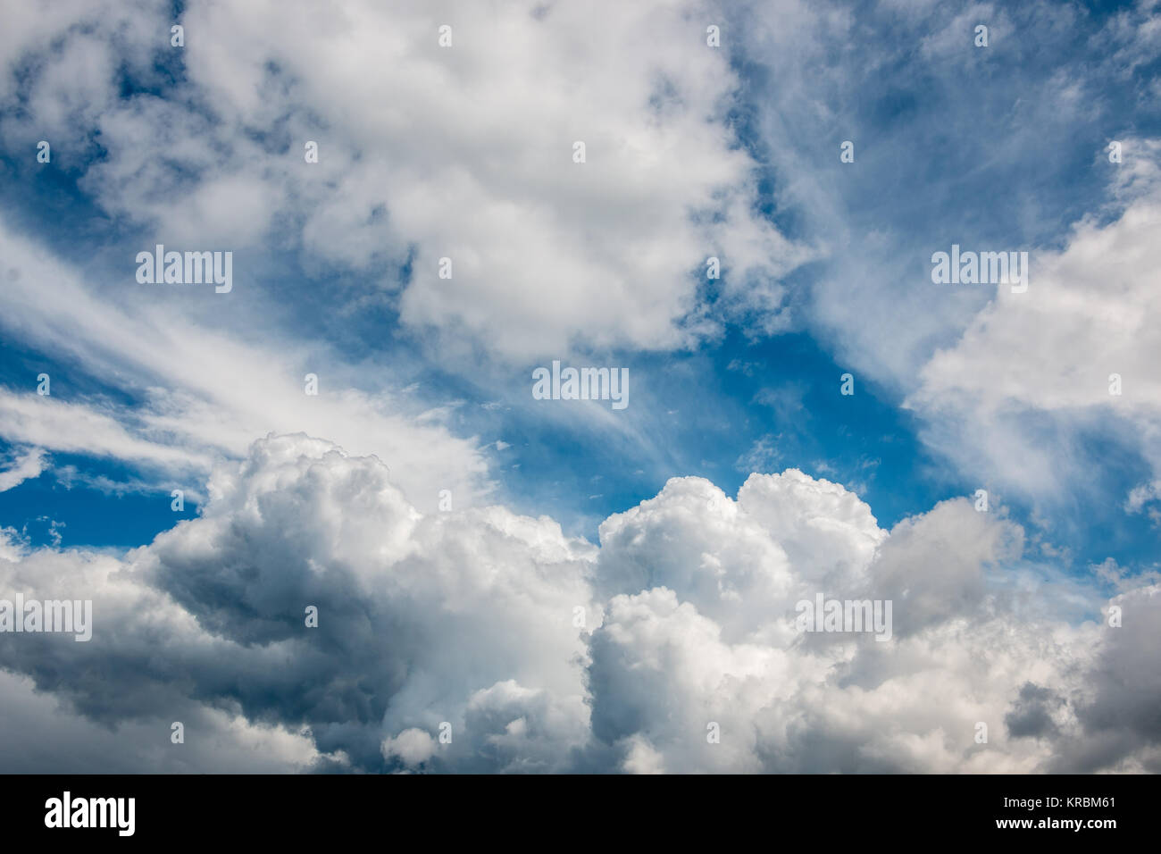 Dramatic deep blue sky and white clouds Stock Photo