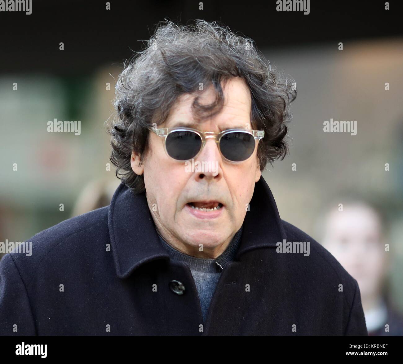 Pic shows: Renowned character actor Stephen Rea spotted doing his Christmas shopping in Oxford Street today 18.12.17 Shoppers laden down with bags as  Stock Photo