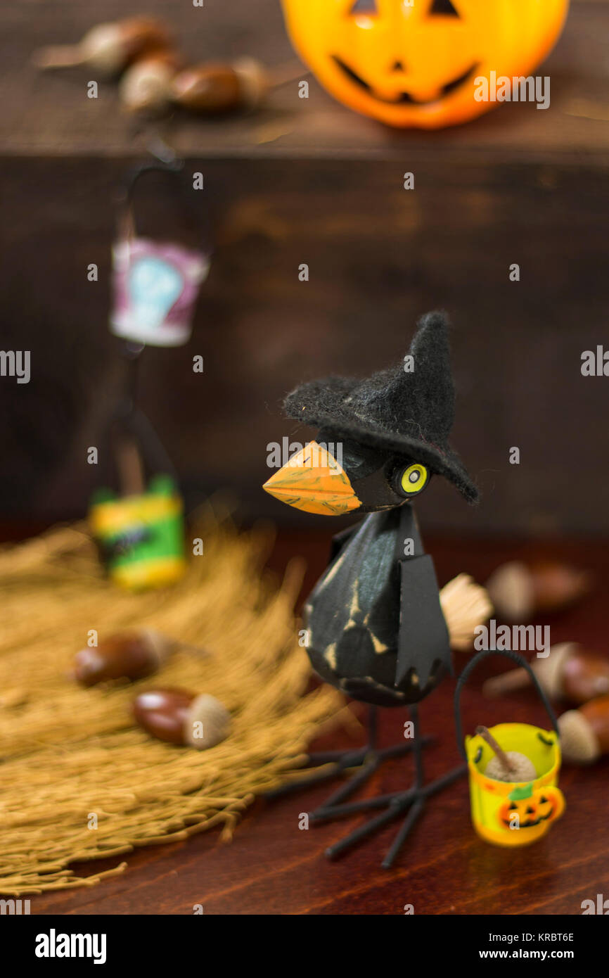 Halloween image with crow and Jack o lantern Stock Photo