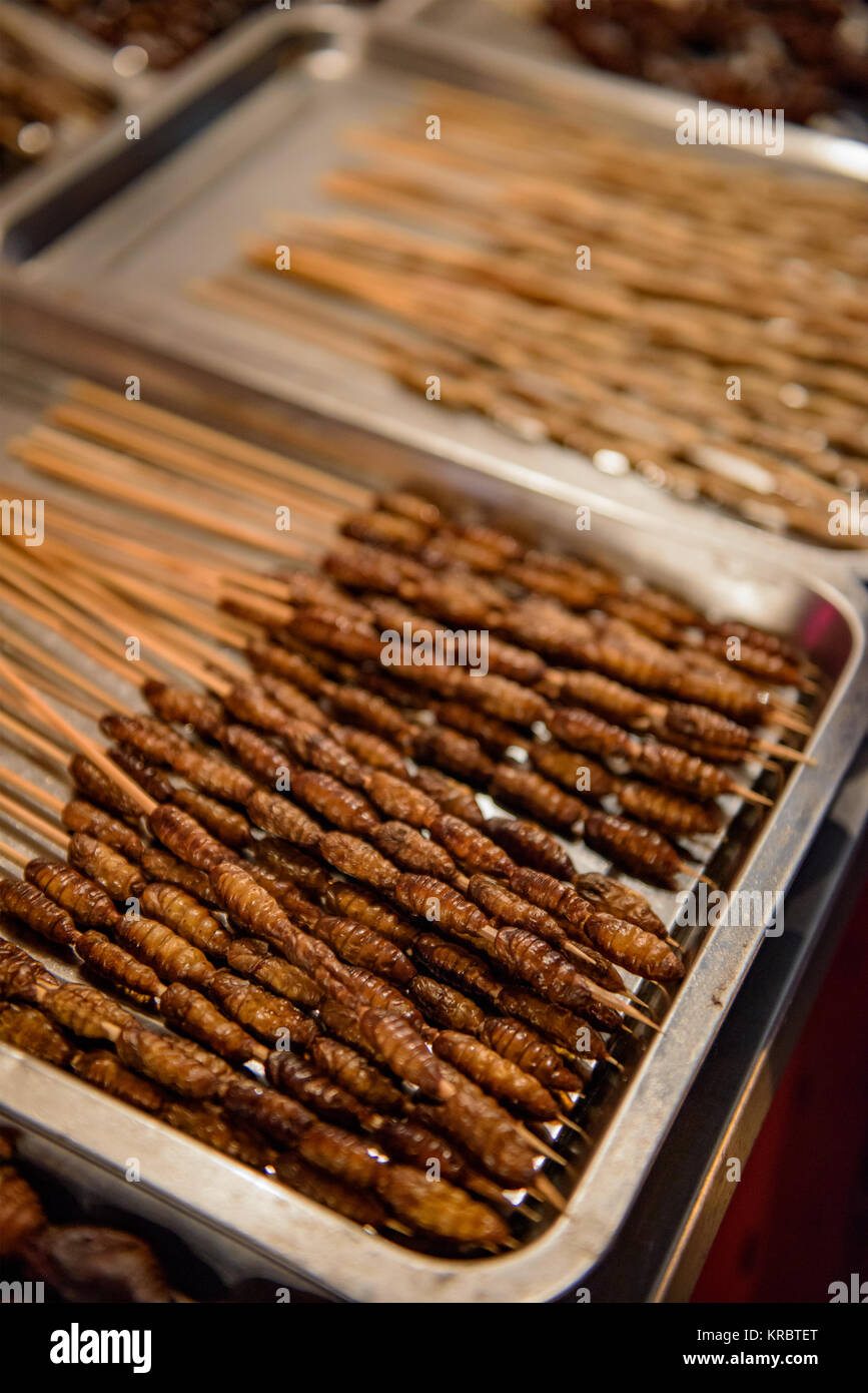 Bugs and worms in a asian food market in Beijing, China. Stock Photo