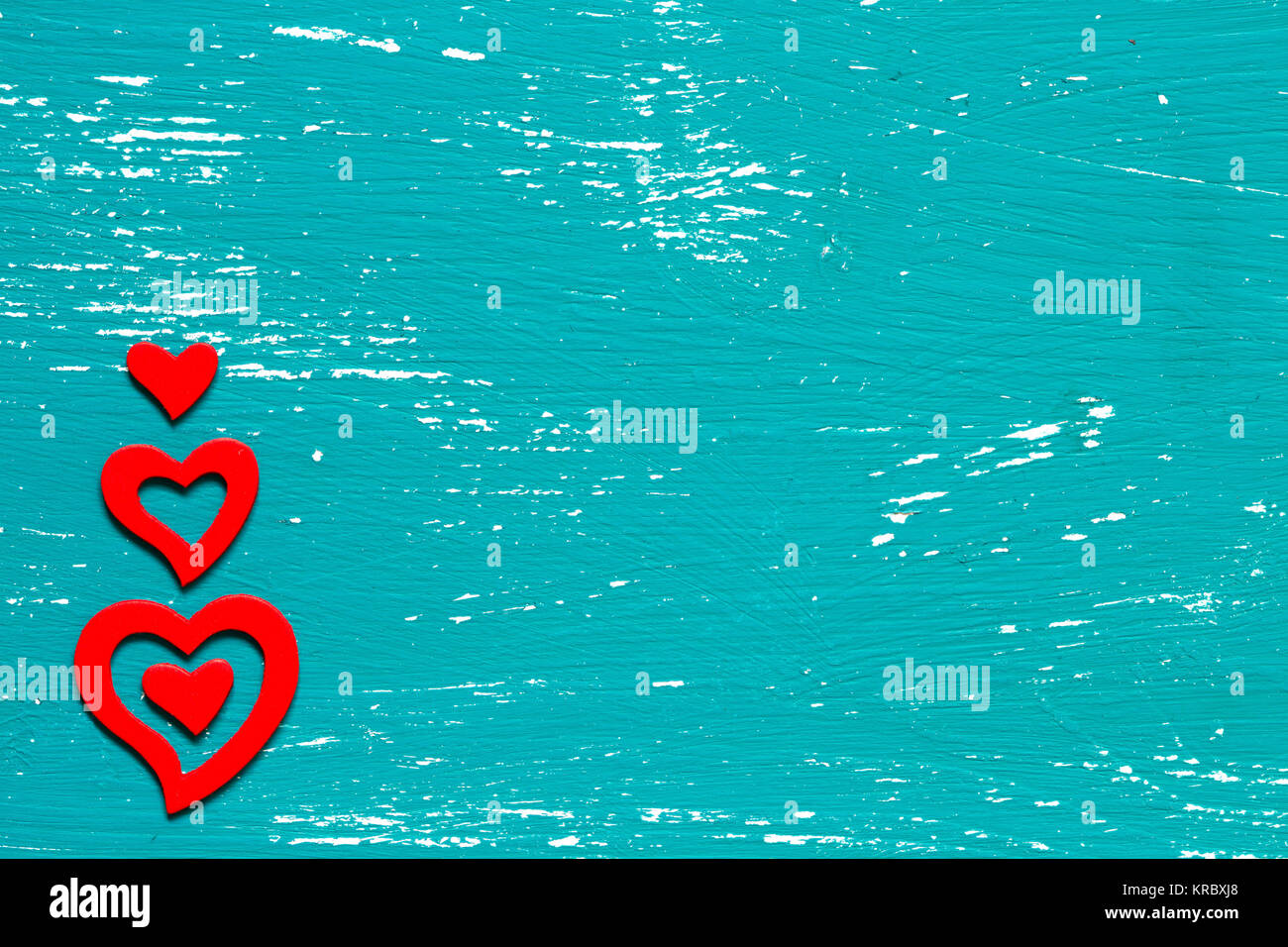 Red hearts on a wooden background Stock Photo - Alamy