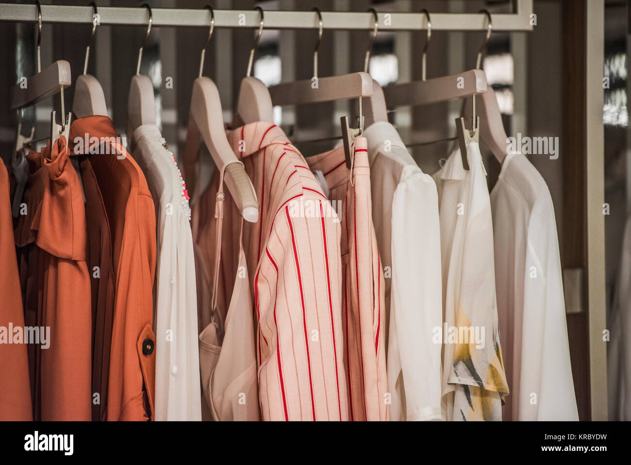 Clothes on hangers in a store in Paris Stock Photo Alamy