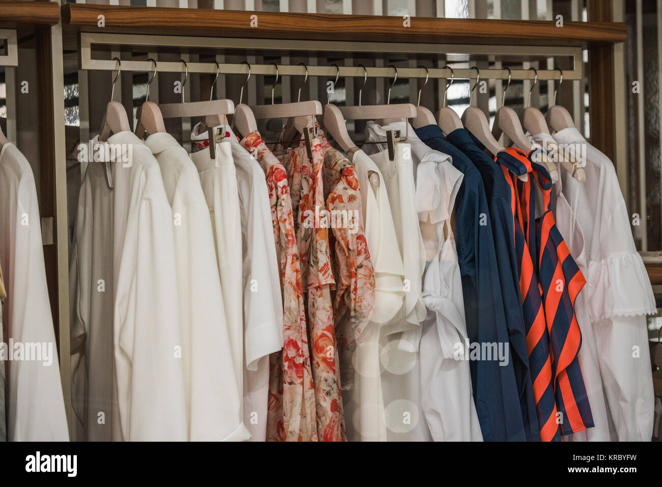 Clothes on hangers in a store in Paris Stock Photo Alamy