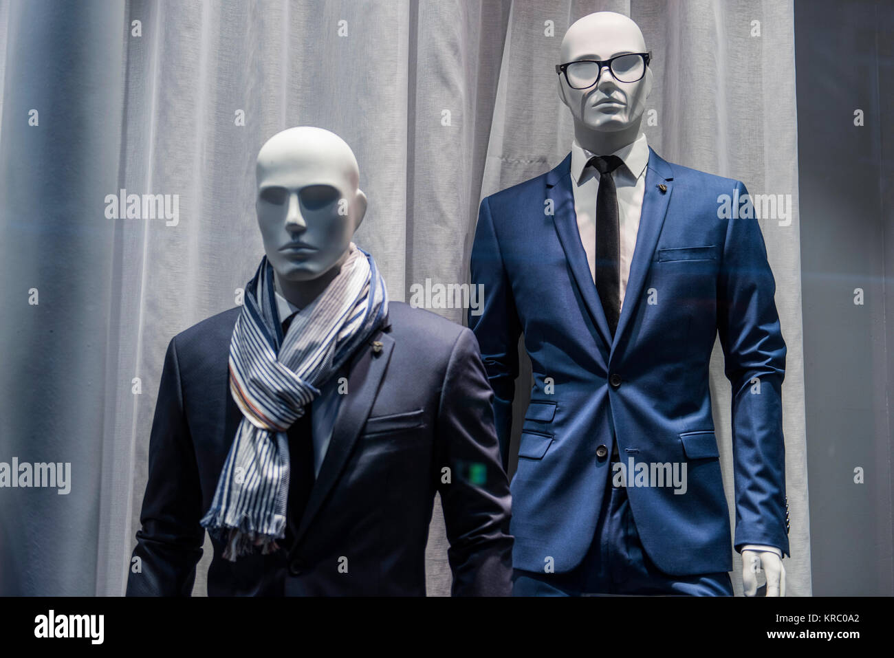 Men suits in a store in Paris. Stock Photo