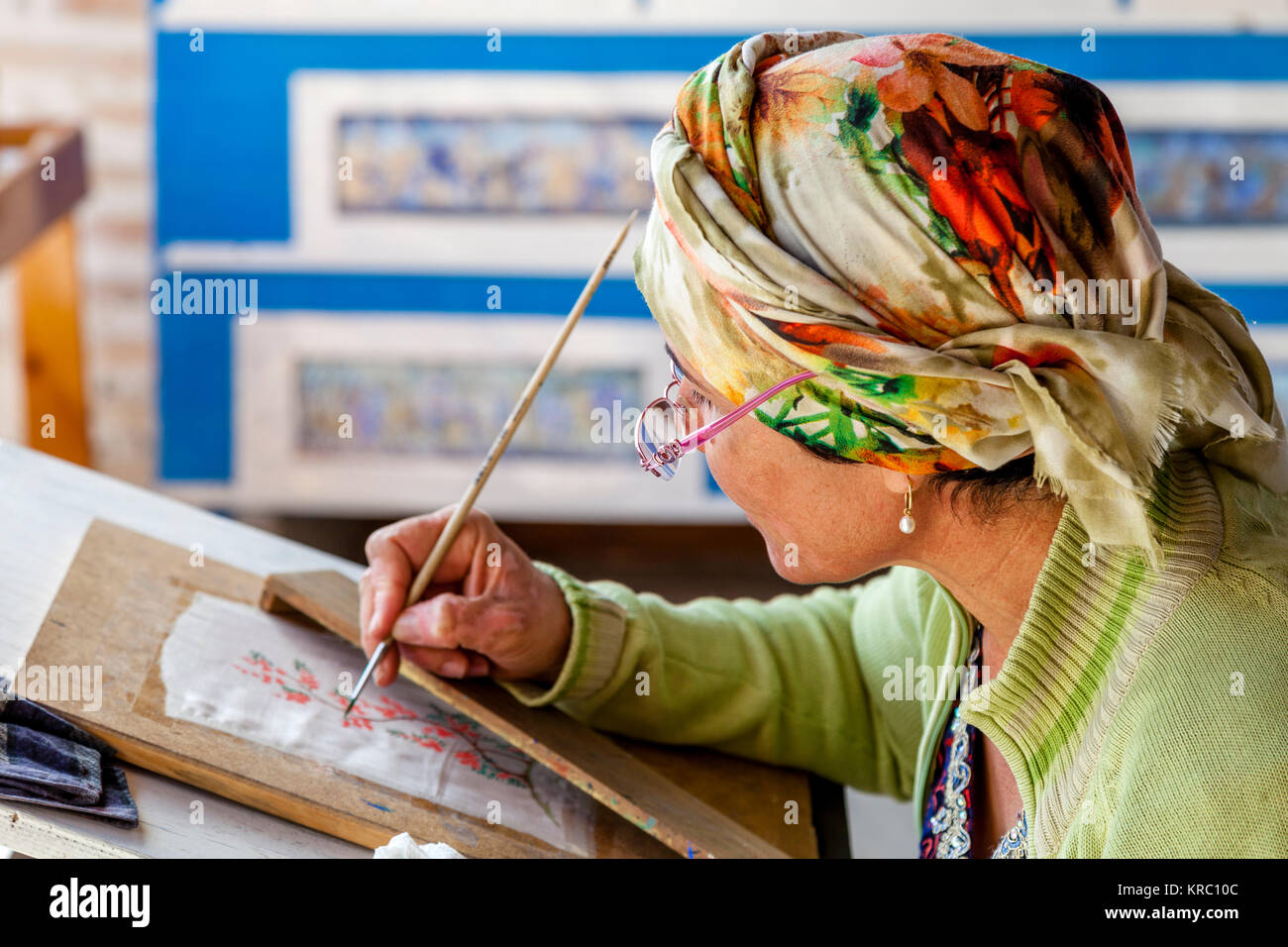 An Artist Working In The Market, Bukhara, Uzbekistan Stock Photo