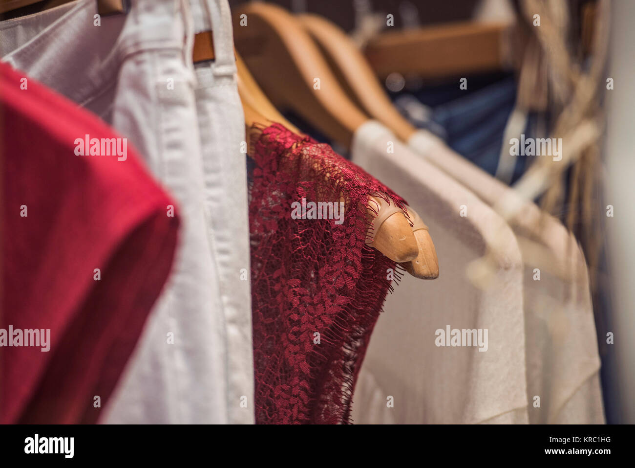 Fancy clothing on racks in a store in Paris Stock Photo - Alamy