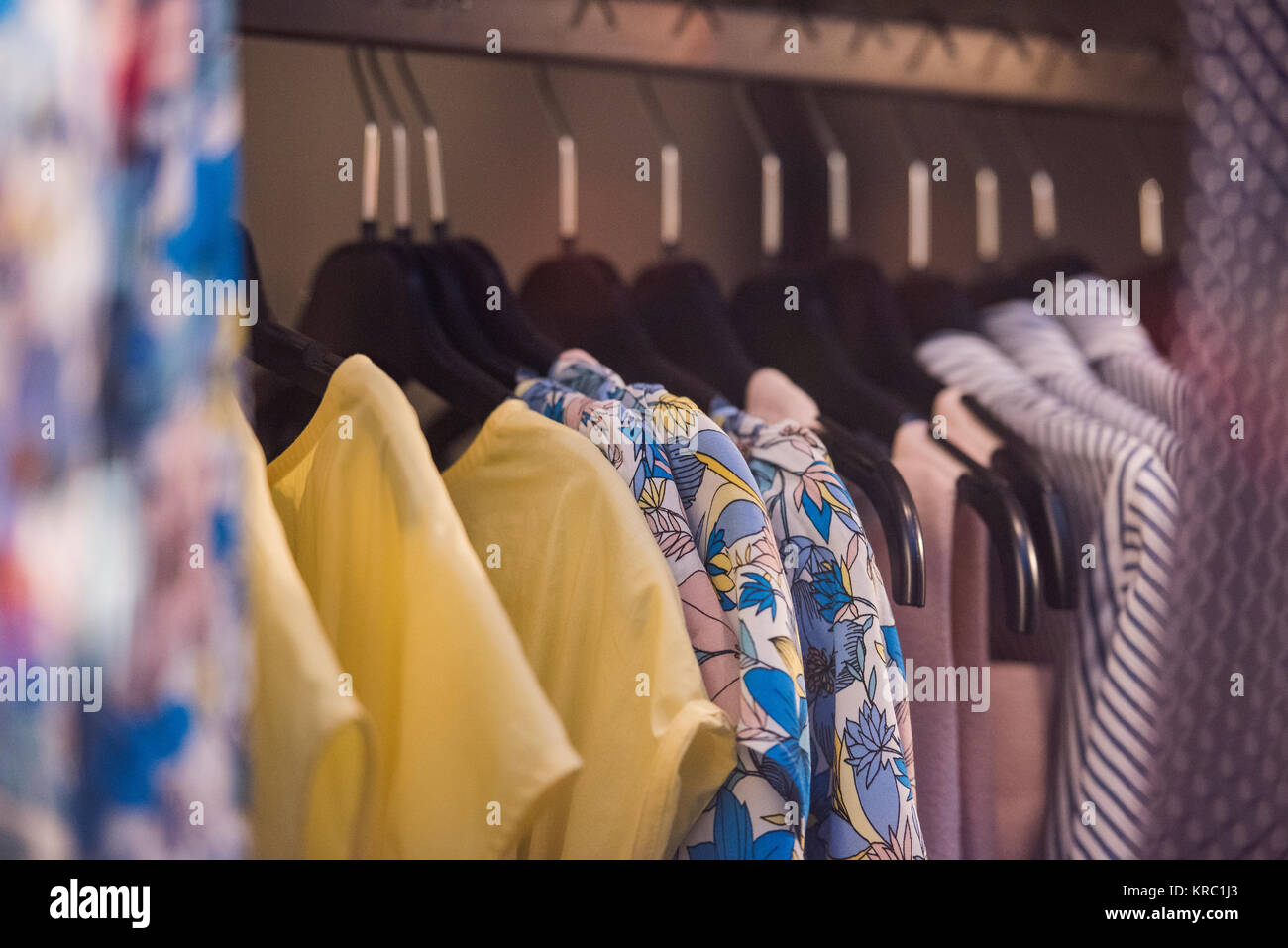 Fancy clothing on racks in a store in Paris Stock Photo - Alamy