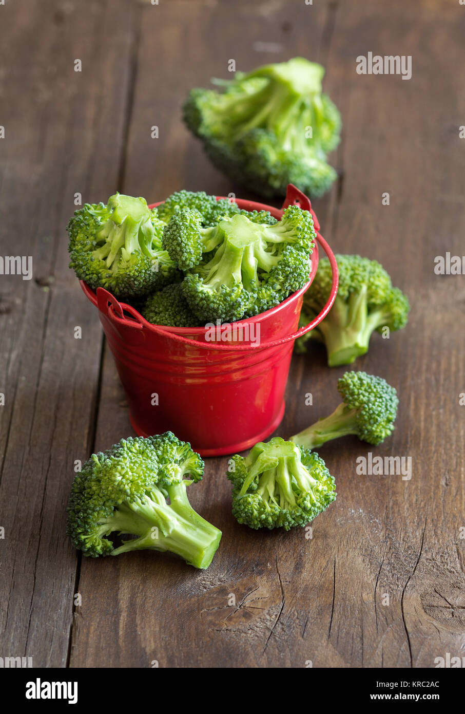 Green broccoli in red bucket Stock Photo Alamy