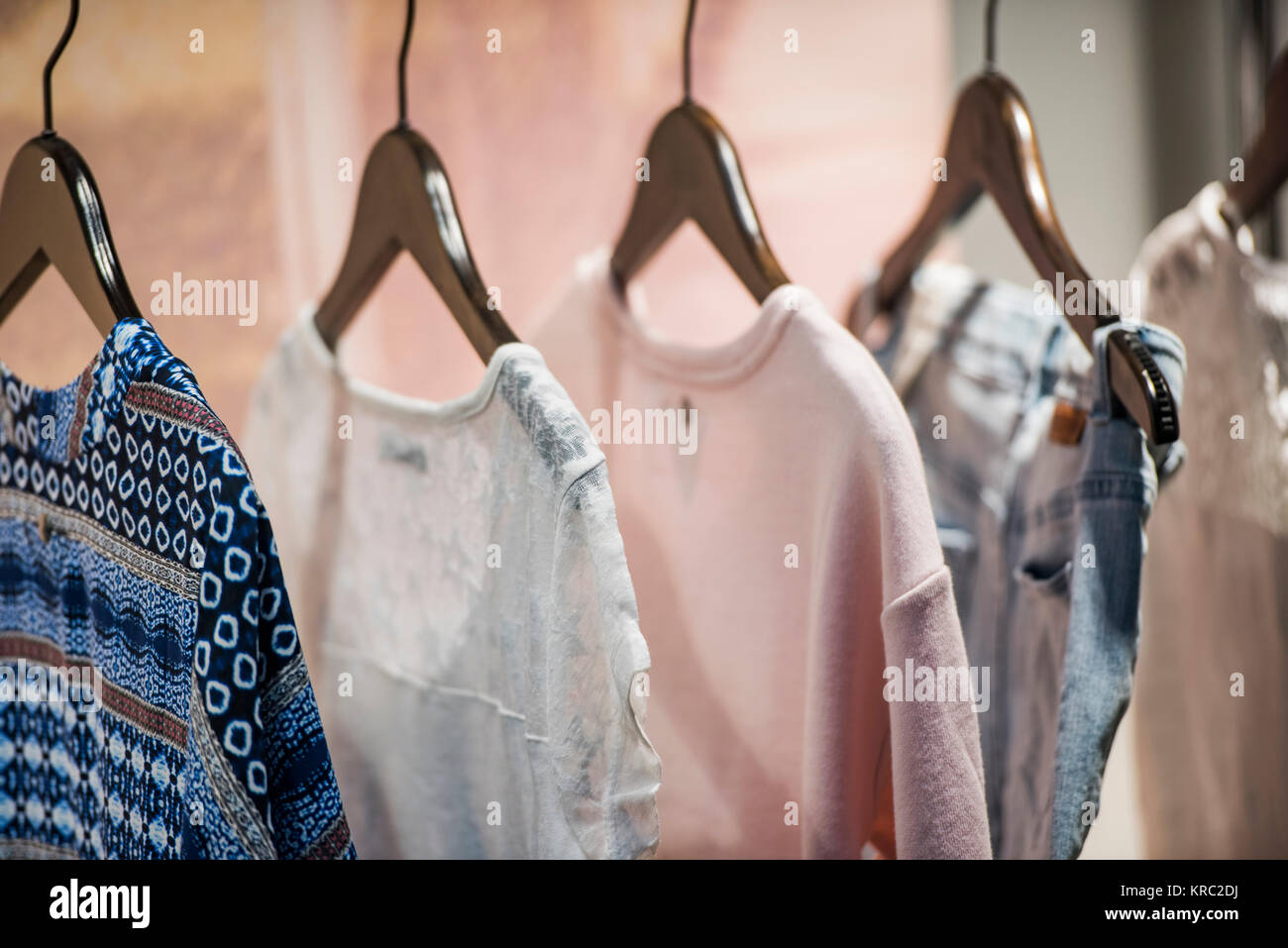 Woman clothing on racks in a store in Paris Stock Photo