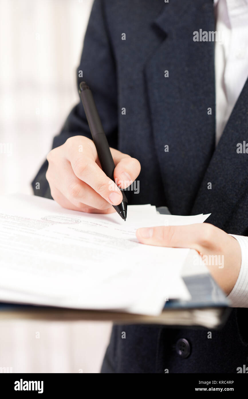 Human business men hand pen writing paper document Stock Photo - Alamy