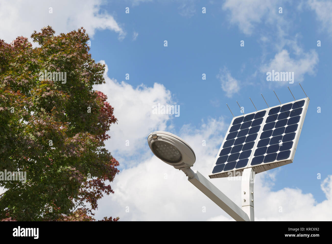 LED street light with solar cell and blue sky background on the street Stock Photo