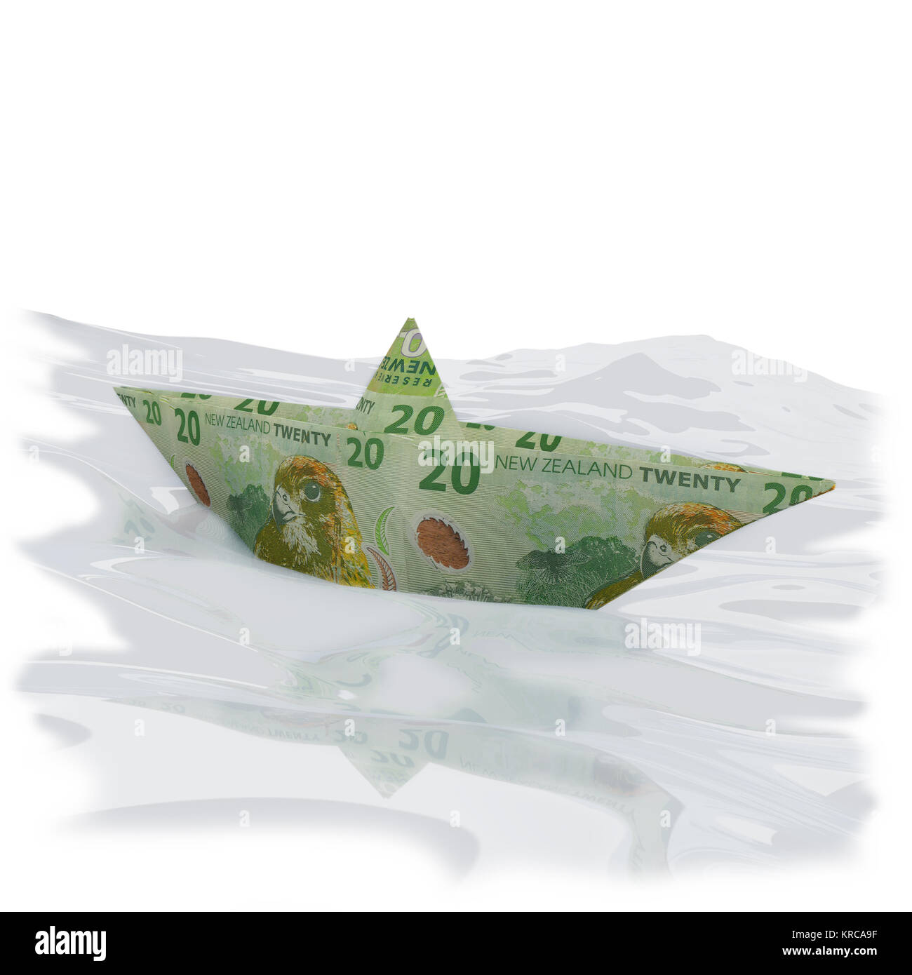 paper boats from 20 new zealand dollar bills Stock Photo