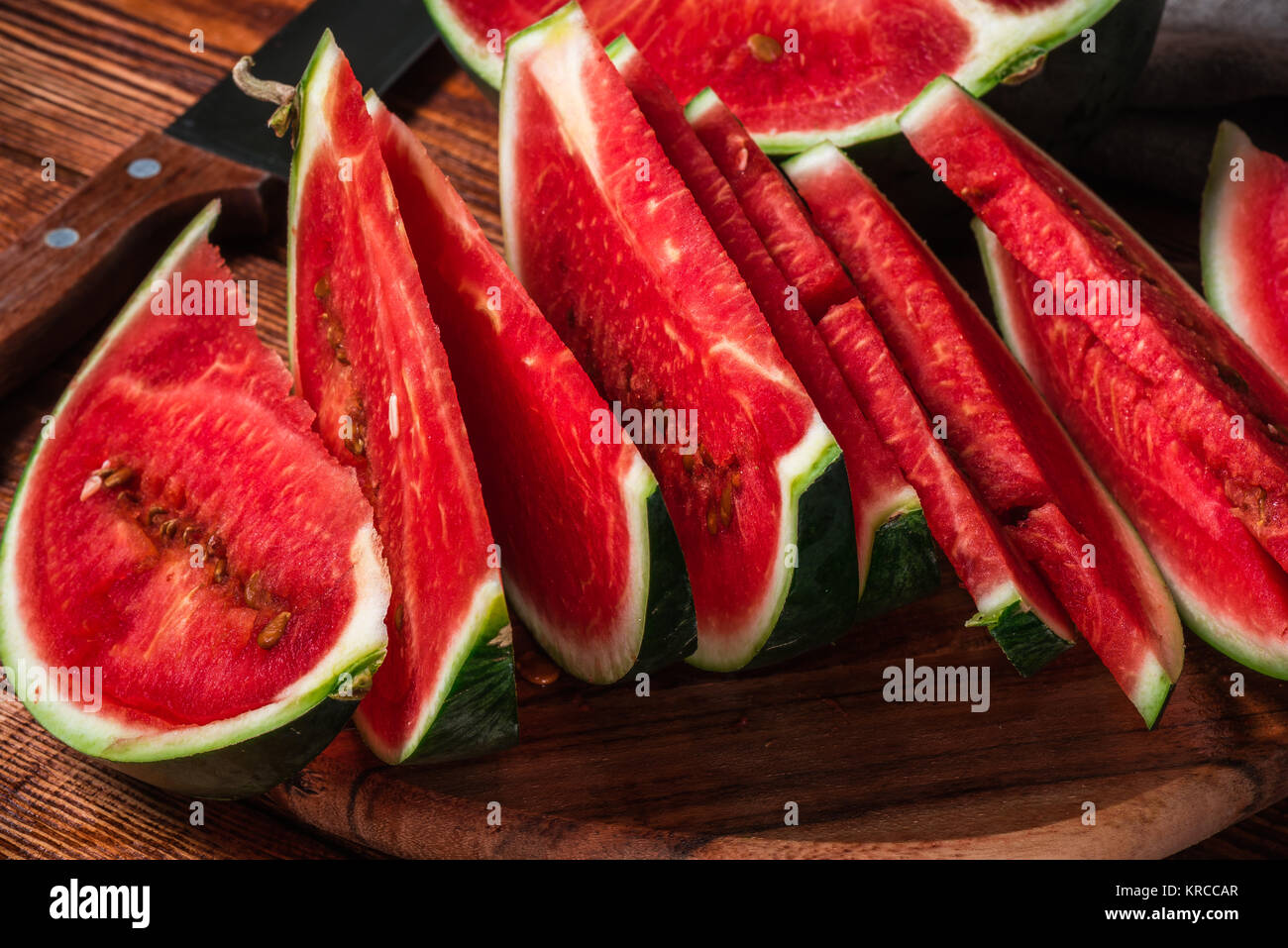 Slices of ripe watermelon lying on the board Stock Photo - Alamy