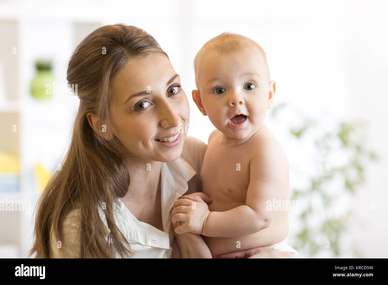 Portrait of happy mother and baby Stock Photo