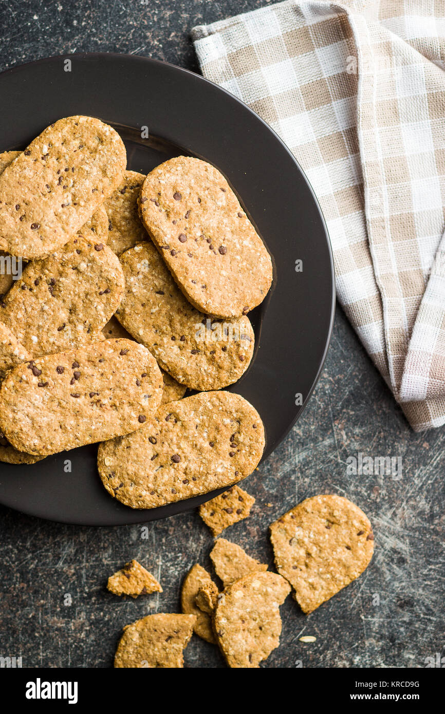 Tasty oatmeal cookies on kitchen table Stock Photo Alamy