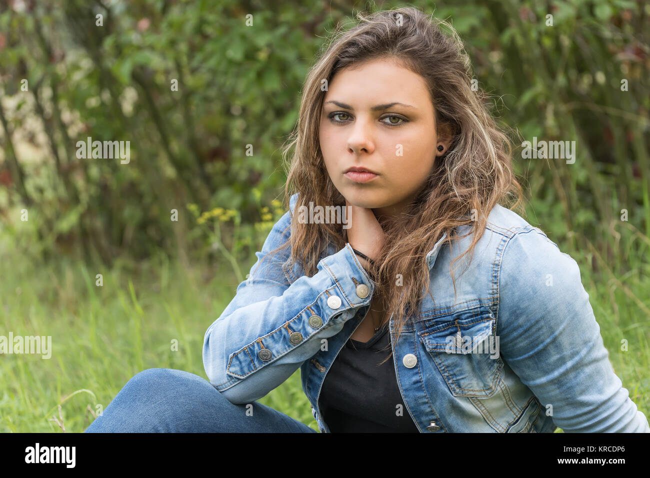 Pensive teenage girl portrait Stock Photo - Alamy