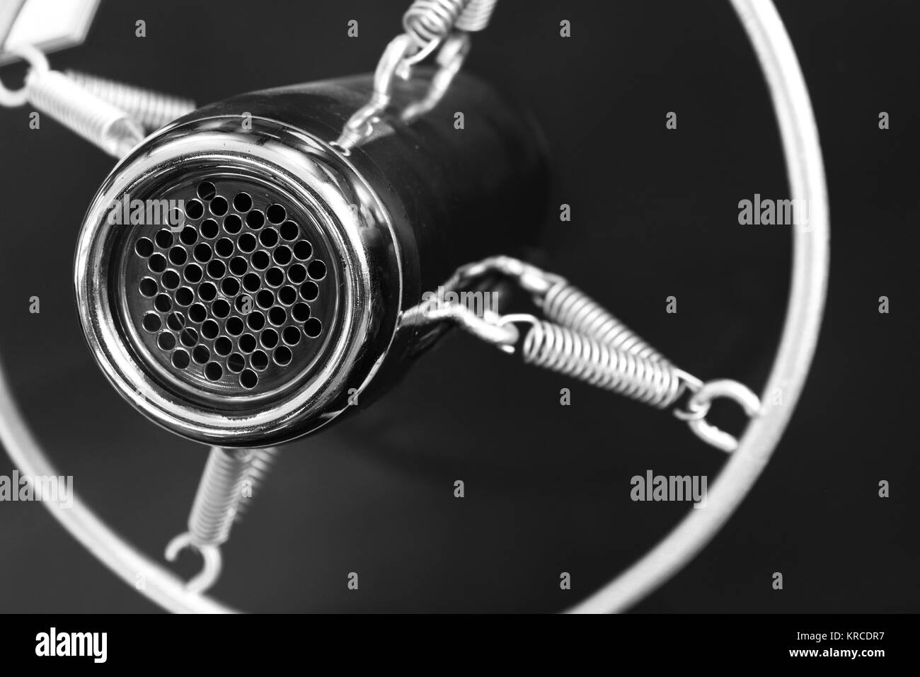 Vintage old round studio voice microphone, black and white Stock Photo