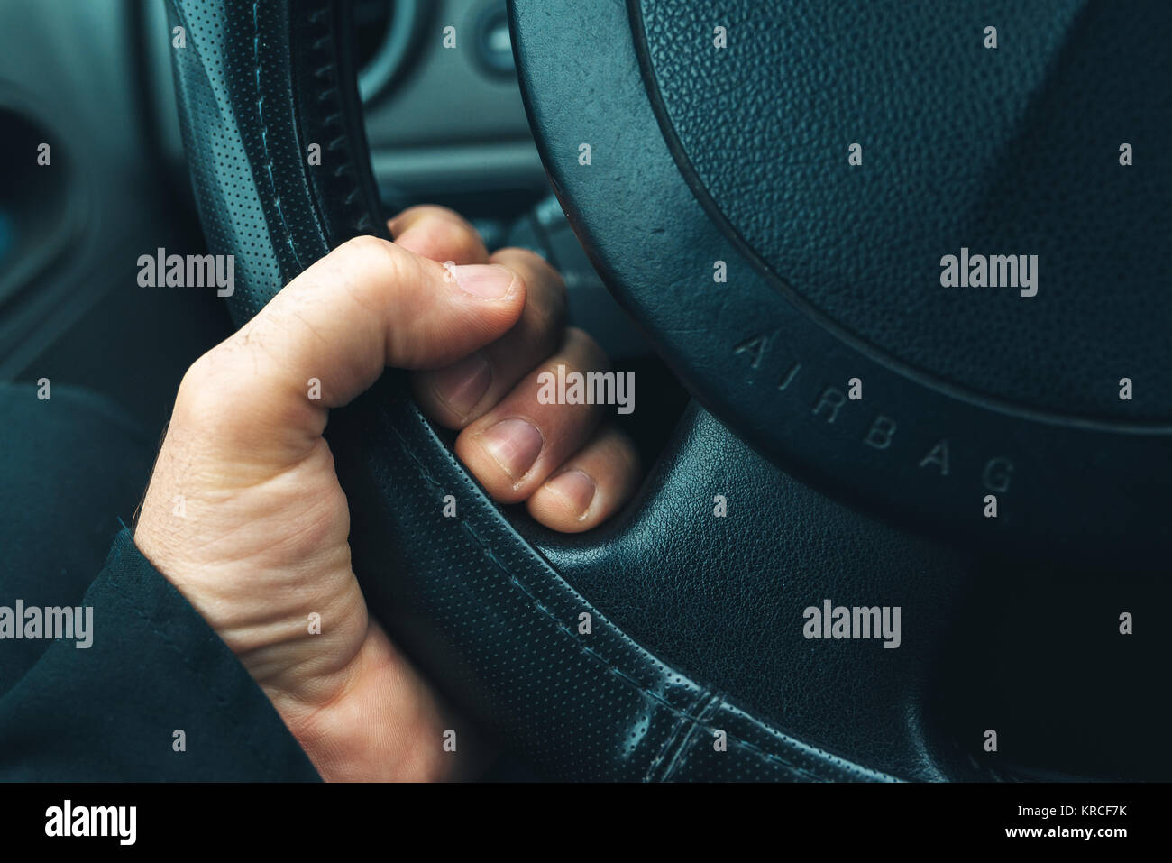 Hand holding steering wheel hi-res stock photography and images - Alamy