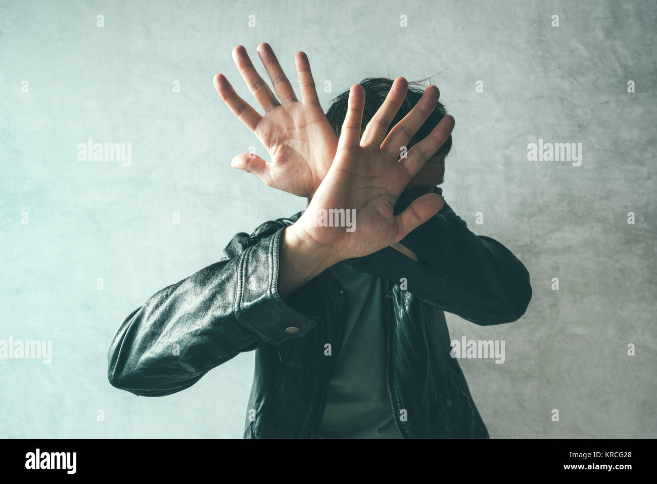 Man scared hands face hi-res stock photography and images - Alamy